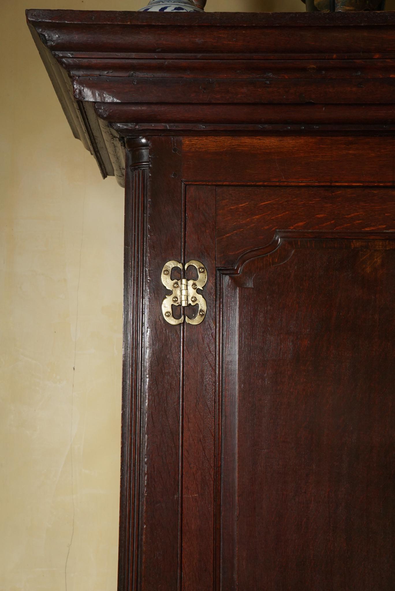 Brass Period George II Oak Cupboard For Sale