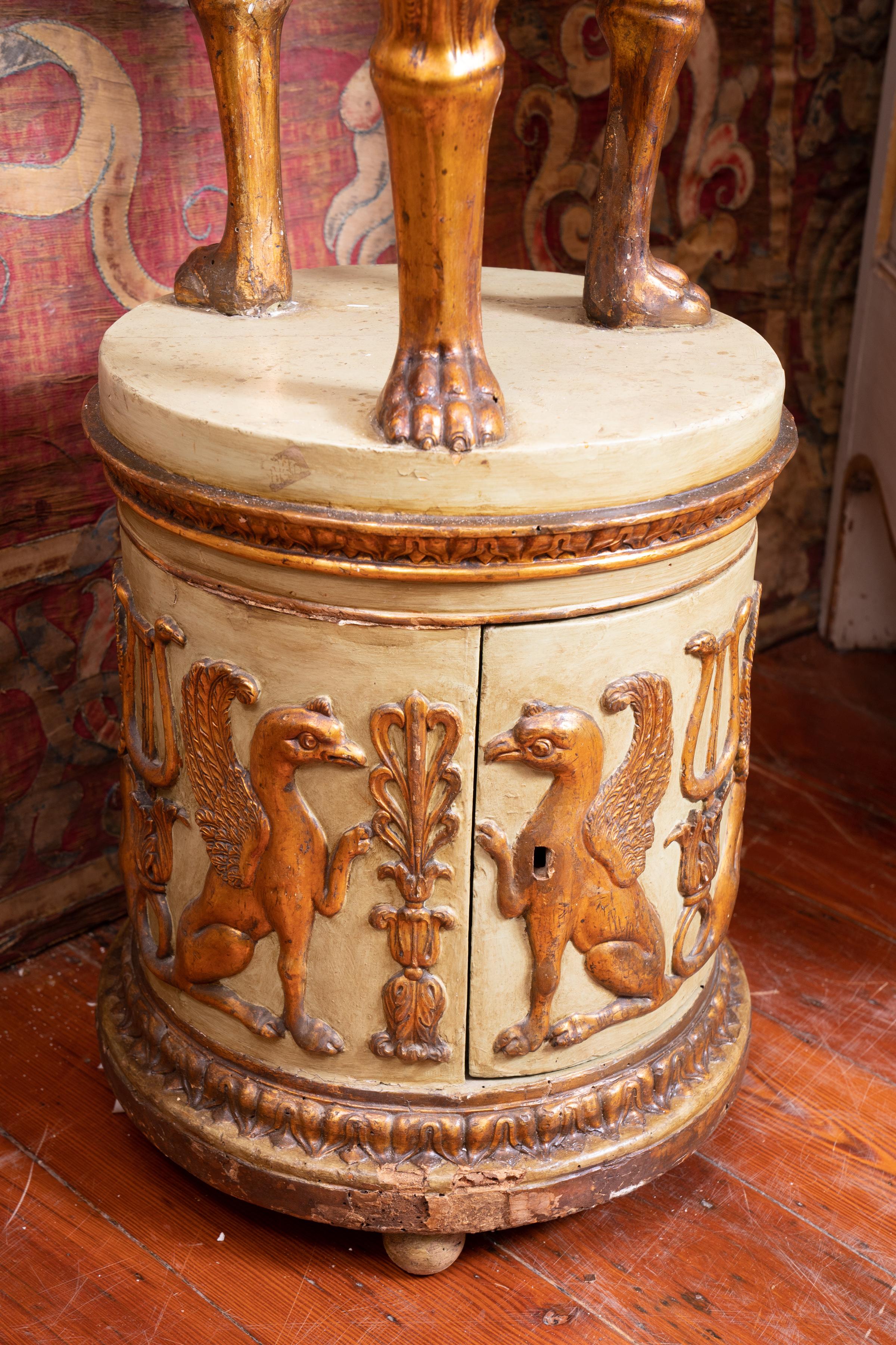 Fantastic Italian gueridon with giltwood carved decoration.