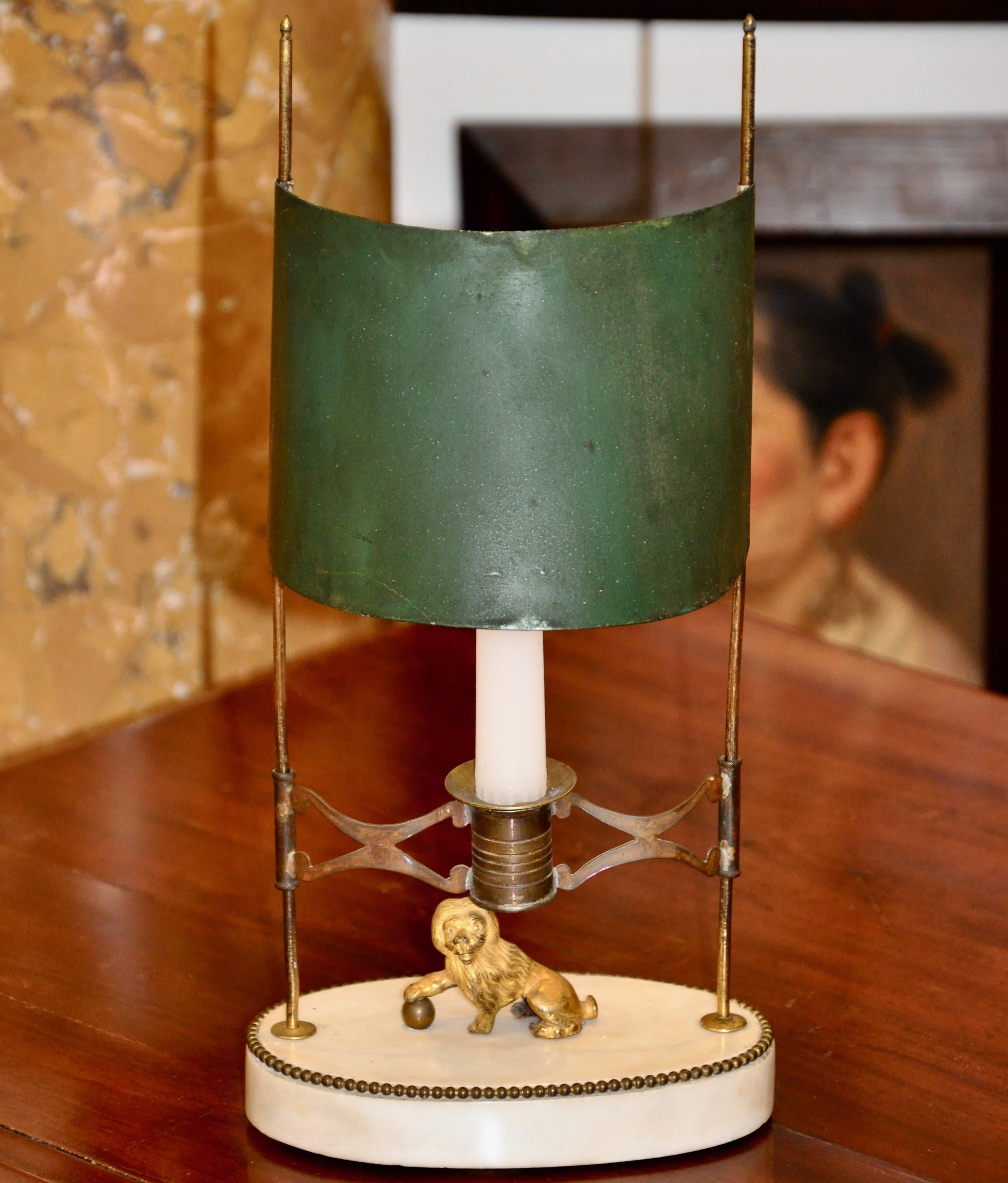 Period gilt bronze marble and tole Bouillotte or reading lamp

--Original Green Tole Adjustable Shade
--Marble Base
--Adjustable Candle Holder
--Naive Lion Adornment

See: 