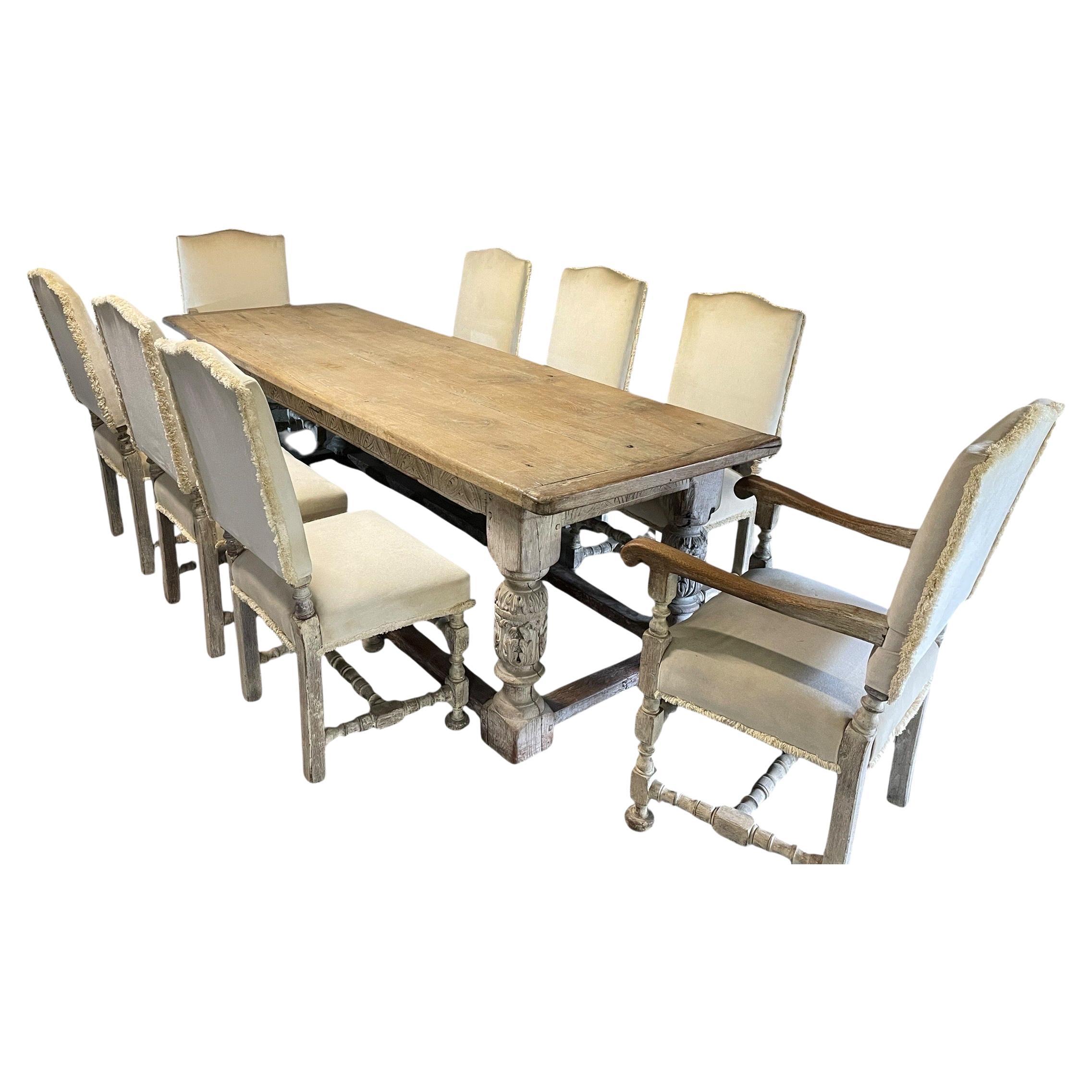 17th Century Oak Refectory Table and 8 Oak Chairs
The base has surround stretchers, fan carved under frieze rails, the turned legs accurately carved in the period style, the thick top consisting of three good sized planks with cleated ends and is