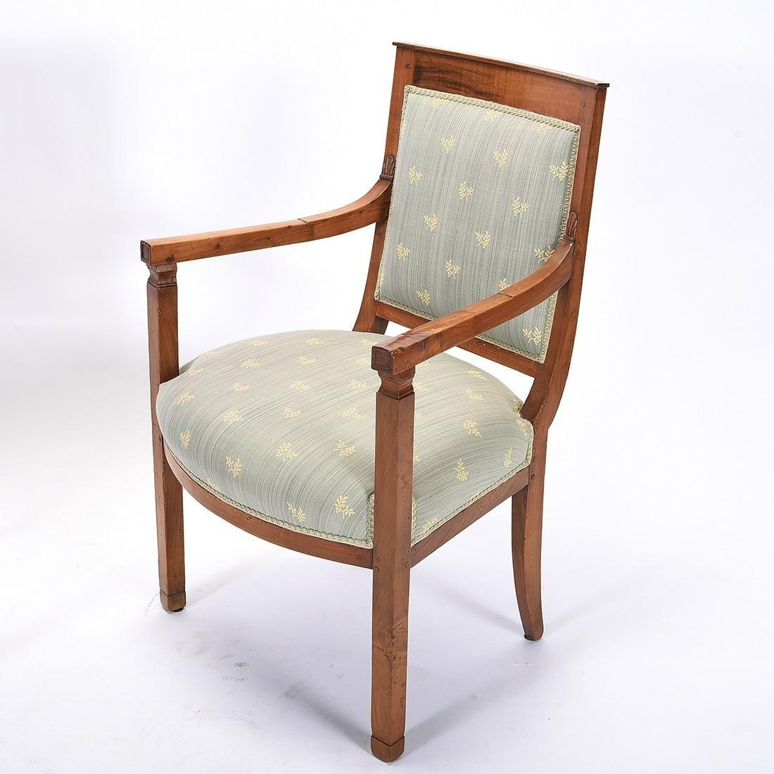Pair of Circa 1800 Period French Directoire Fruitwood Fauteuil Armchairs. Upholstery in light blue striated fabric with white sprigs. Coil spring seat foundation. Aged finish.