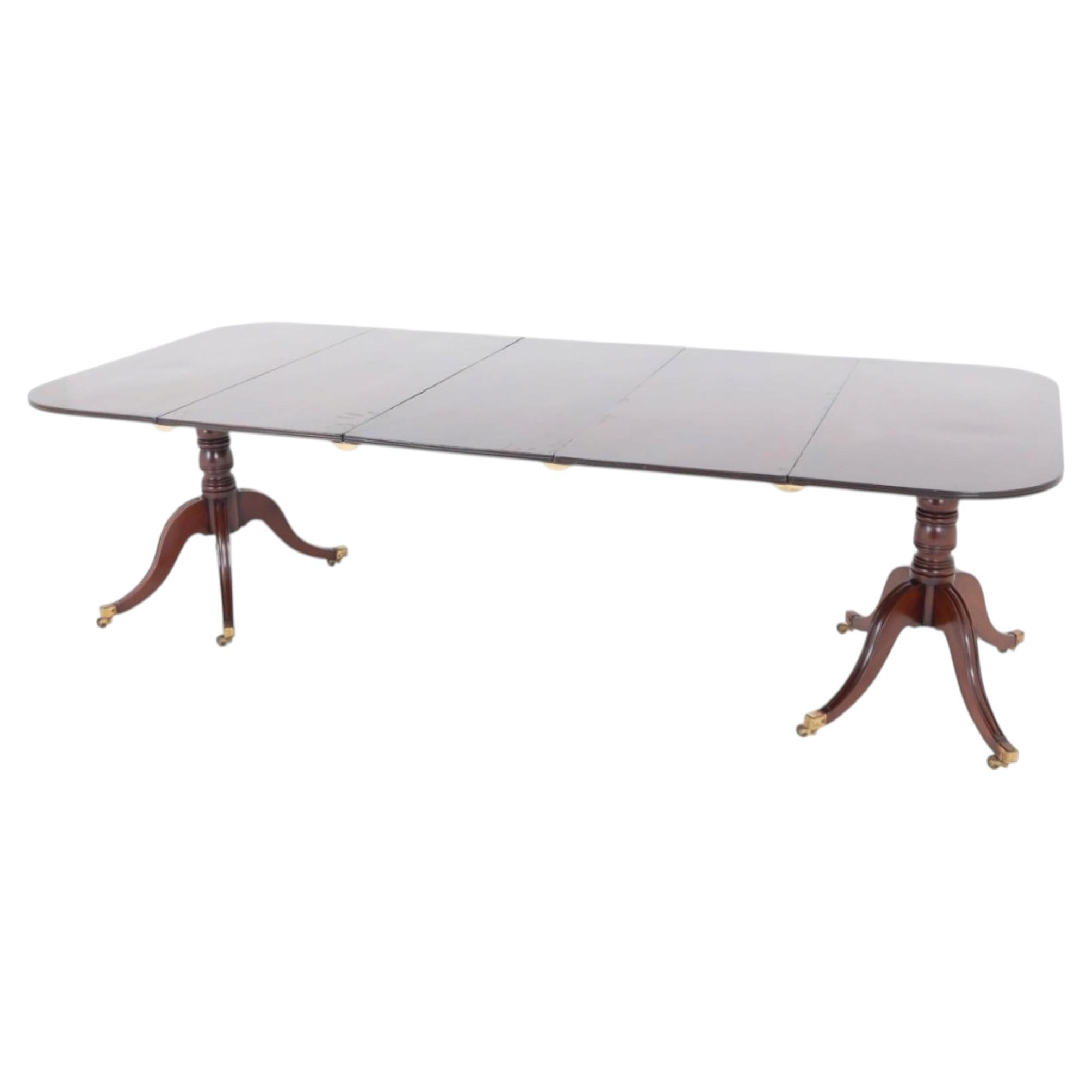 Table de salle à manger d'époque en acajou à deux pieds 1810