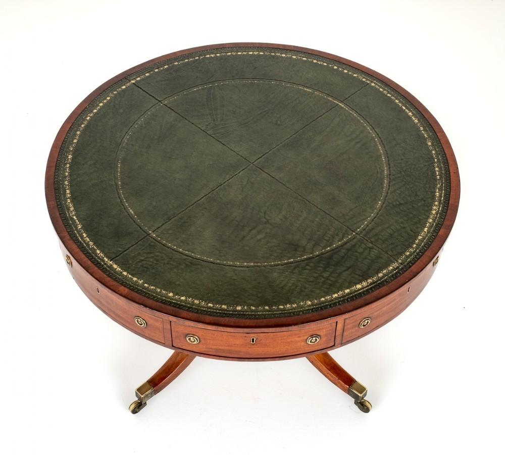This Quality Regency Drum Table is Raised upon Typical Regency Shaped Legs which Retain Their Original Brass Box Castors.
Period Regency
The Table Column Being of a Ring Turned Form.
The Table Features 4 Working Oak Lined Drawers (note the fine