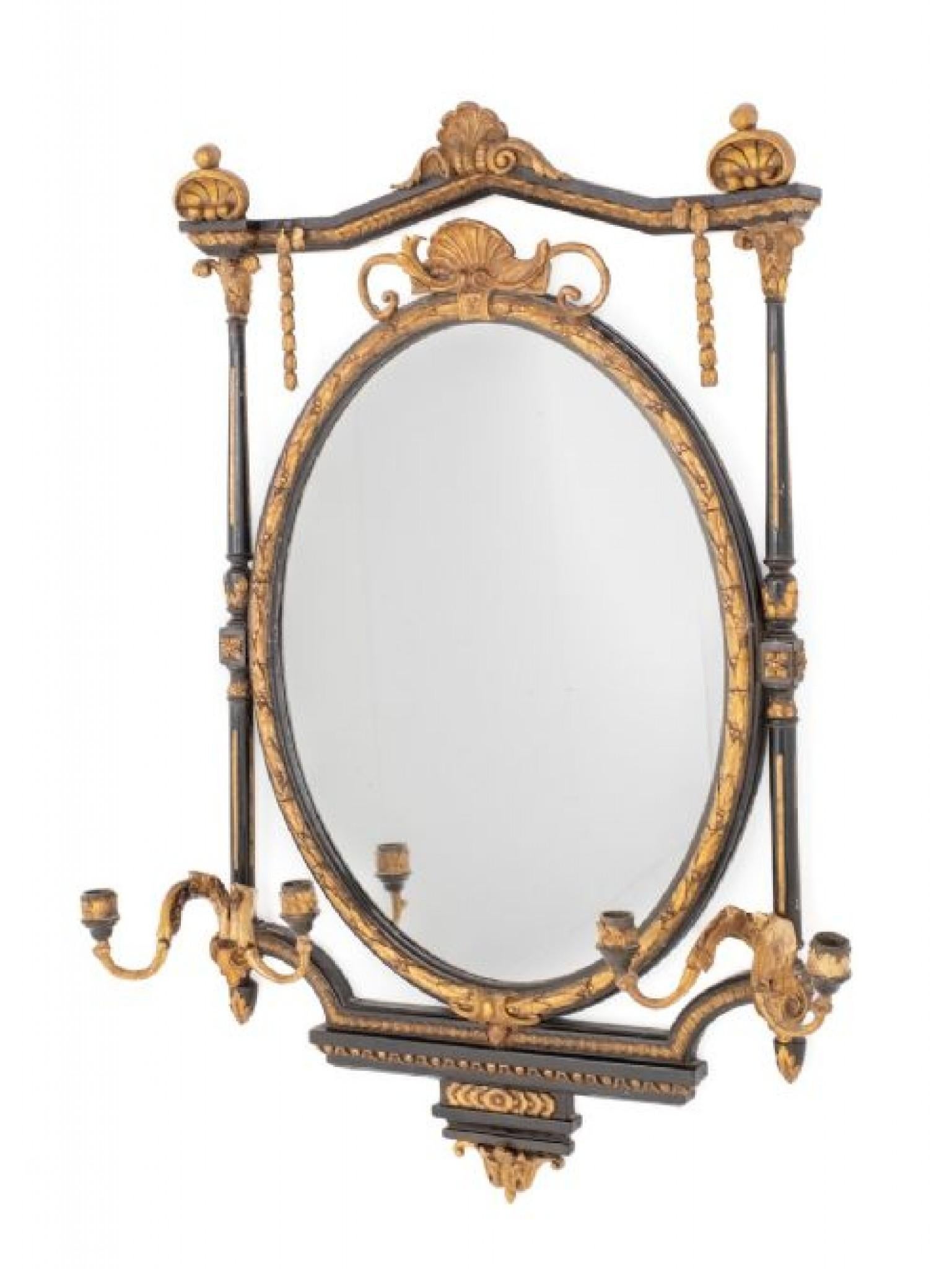 Stylish Regency Ebonised and Gilt Wall Mirror
Please scroll through for more pix - this ships anywhere, please get in touch
Period Regency mirror, looks like it has come off the set of Bridgerton
This Mirror Has an Oval Frame. 
The Mirror Features 2