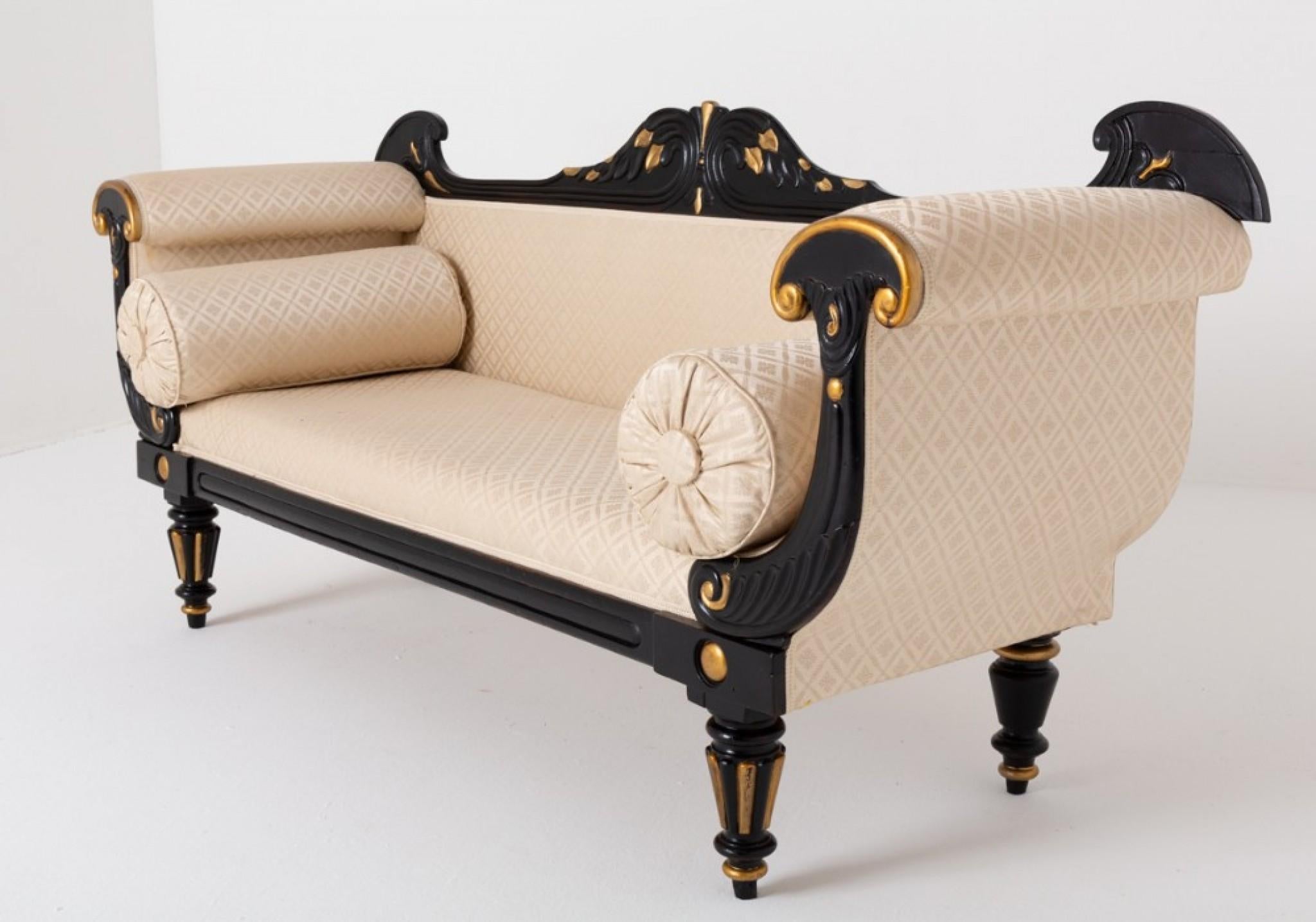 Rather Splendid Regency Ebonised and Gilt Double Ended Settee.
This Settee is Raised upon Turned and Fluted Legs.
Period Regency
The Arm Supports Being of a Typical Regency Carved and Shaped Form as is The Back.
The Settee Has Recently Been