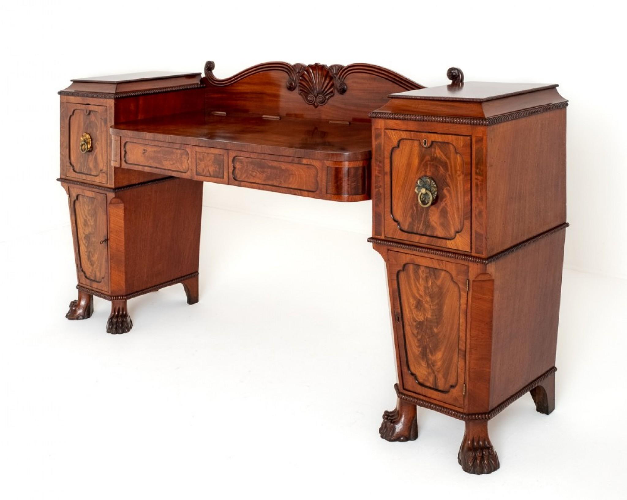 Stunning Mahogany Regency Sideboard (attributed to George Bullock)
Period Regency
This Wonderful Sideboard is Raised upon Carved Lions Paw Feet.
Having an Arrangement of Drawers and Cupboards.
The Whole of the Sideboard Boasting Wonderful Flame