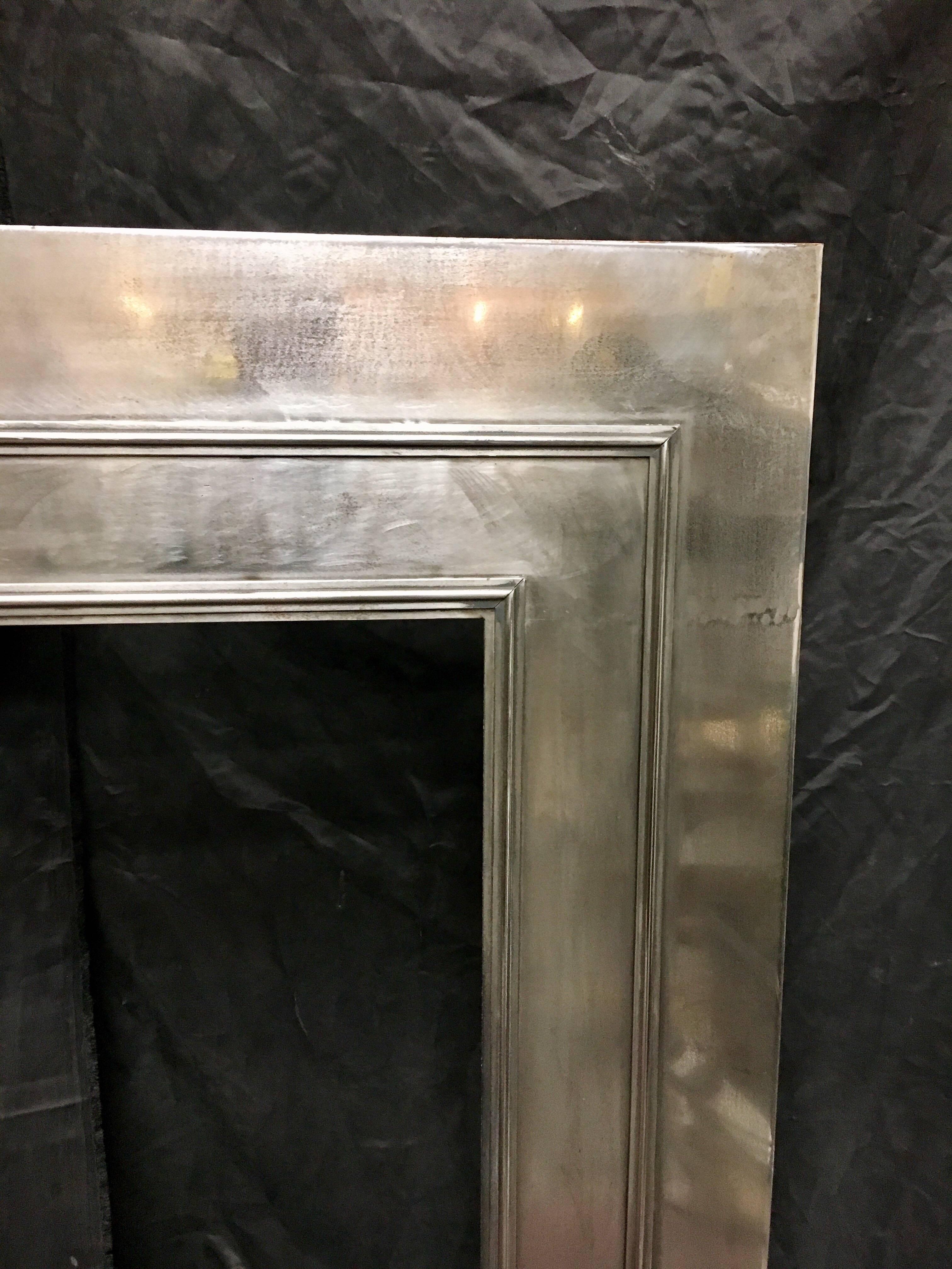 A fully polished Steel 20th century Regency style fireplace insert, will suit a fire basket or ready to take a baby brick fire chamber.
English 1950c
Fire opening size: 770mm wide x 825mm high 