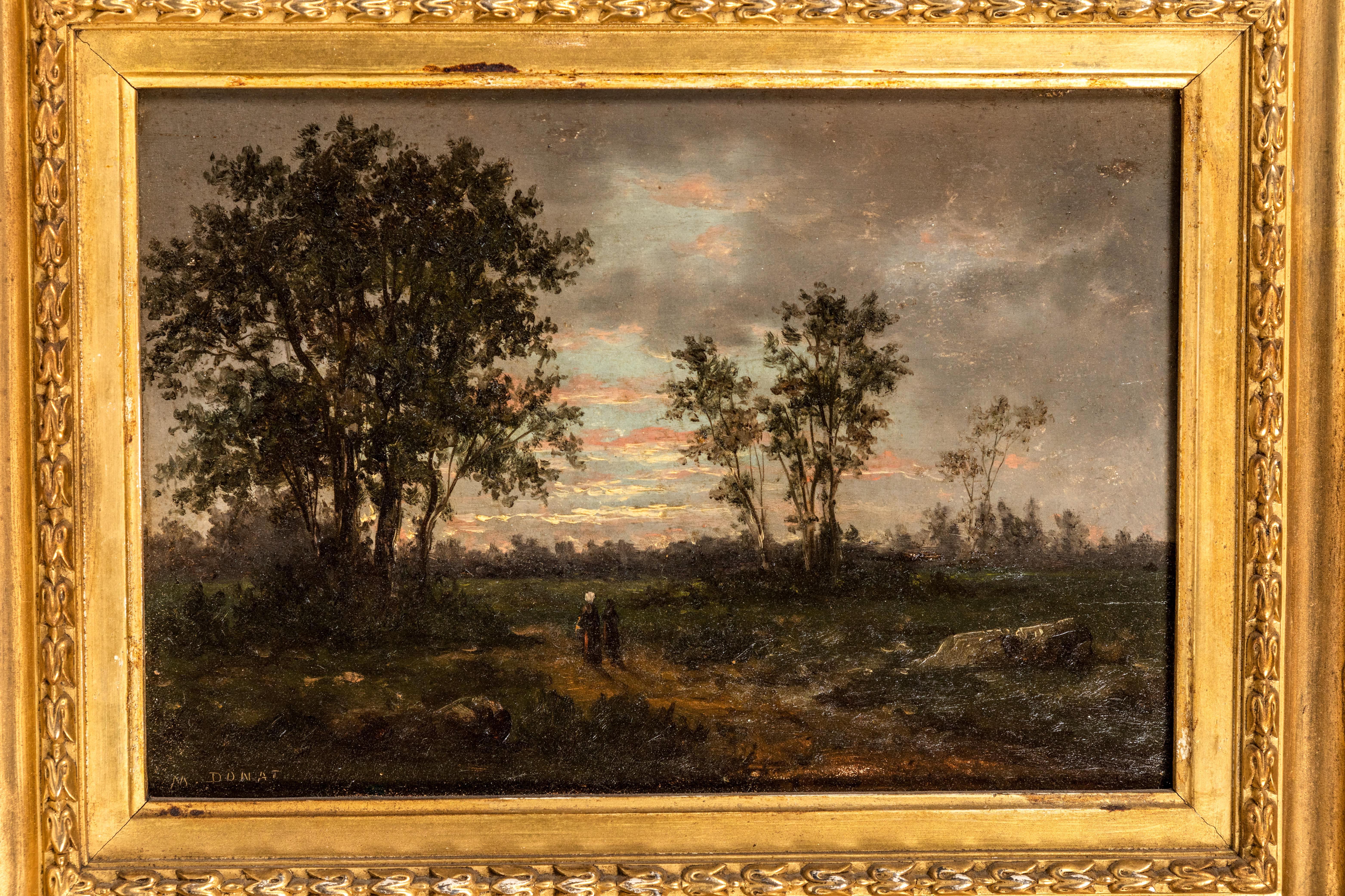 Beautifully rendered, 19th century, oil-on-board, French, Barbizon-school painting of figures in a landscape - signed, “M. Donat”, lower left, and inscribed by the artist on the reverse. Held in a richly hand carved, gessoed, and gilded frame.