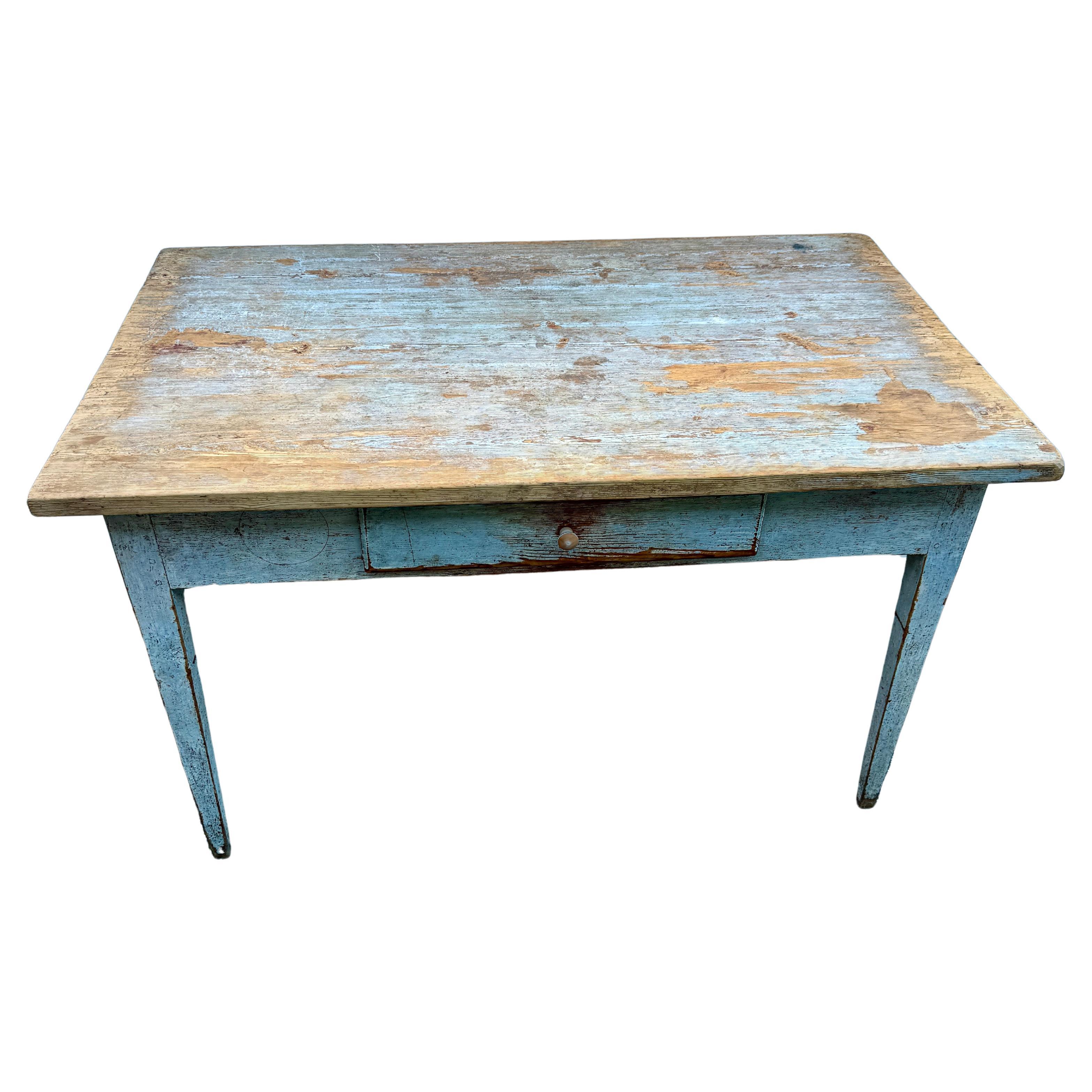 Swedish Gustavian Blue Painted Office Desk Table With Drawer, 1790-1810

Original Blue Painted Gustavian Desk with One Drawer. This piece is very solid and sturdy with removable top. Wonderful, versatile piece with fantastic patina that can be used