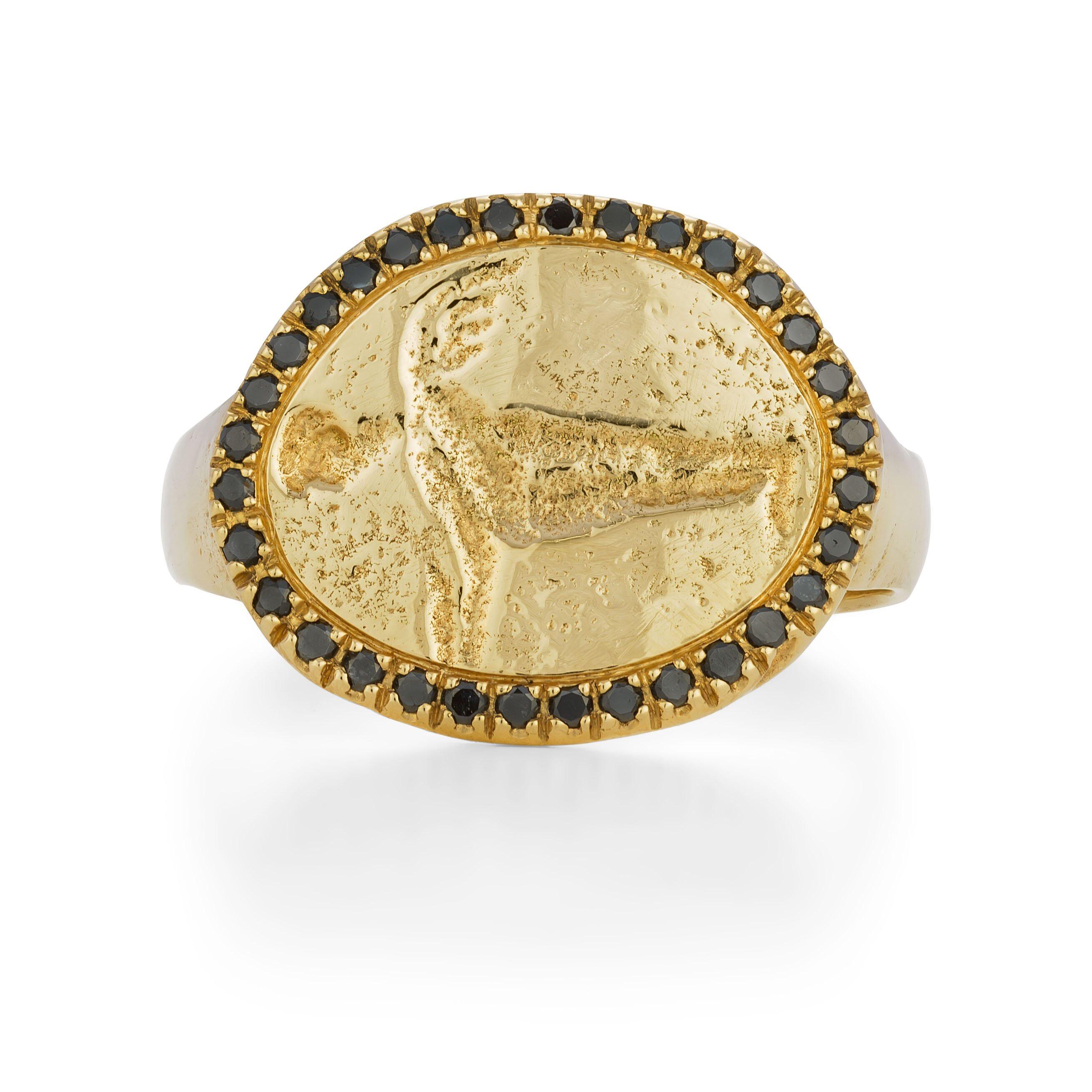 Peristera Ring with Black Diamond, 18 Karat Yellow Gold
In a classic signet ring shape the engraved design is encircled with a ring of black diamonds, set in 18K solid yellow gold. Handcrafted and individually cast in solid yellow gold. Handcrafted