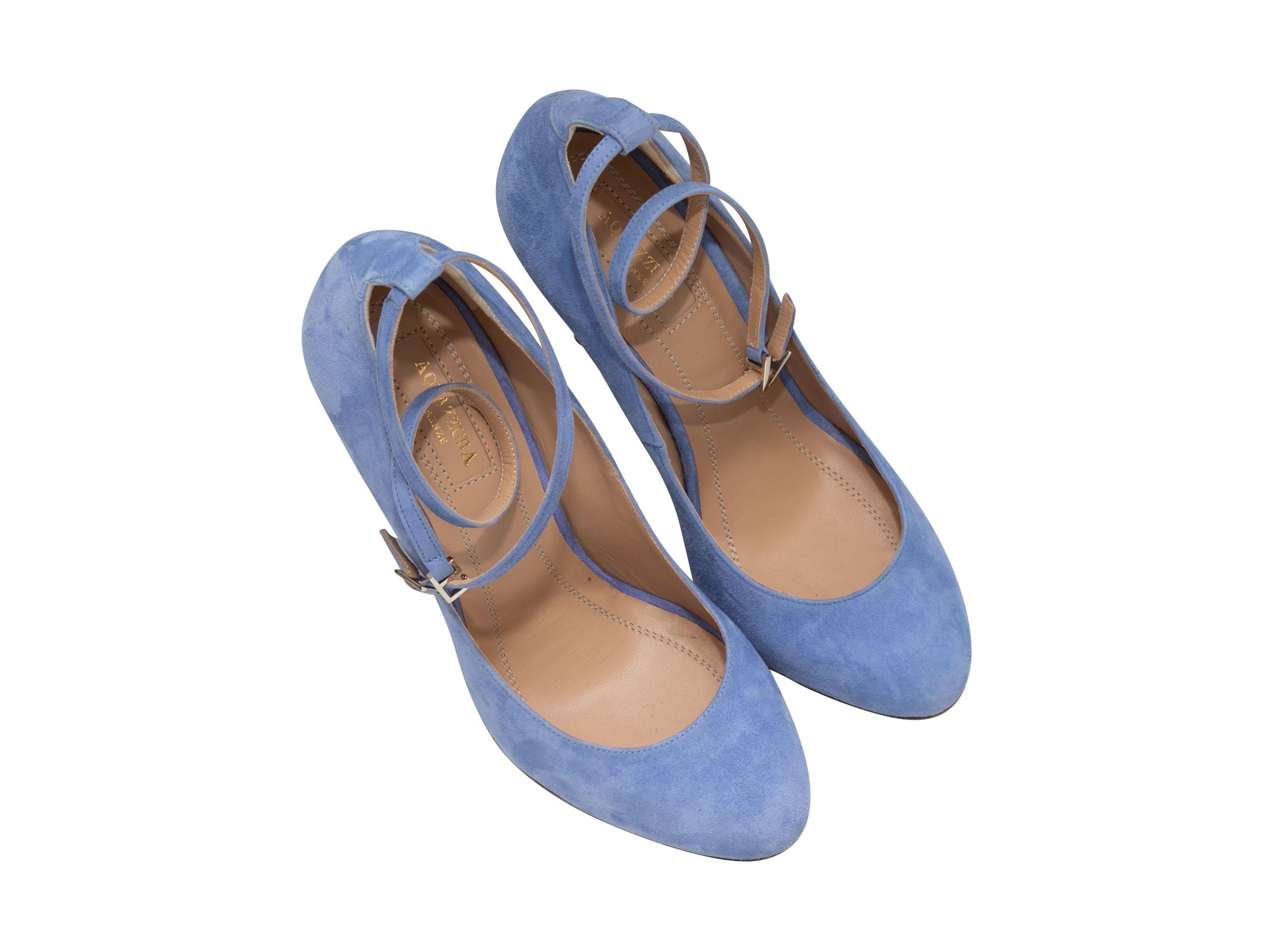 Periwinkle suede ankle strap pumps by Aquazzura. Gold-tone buckle closures at ankle straps. 4.25