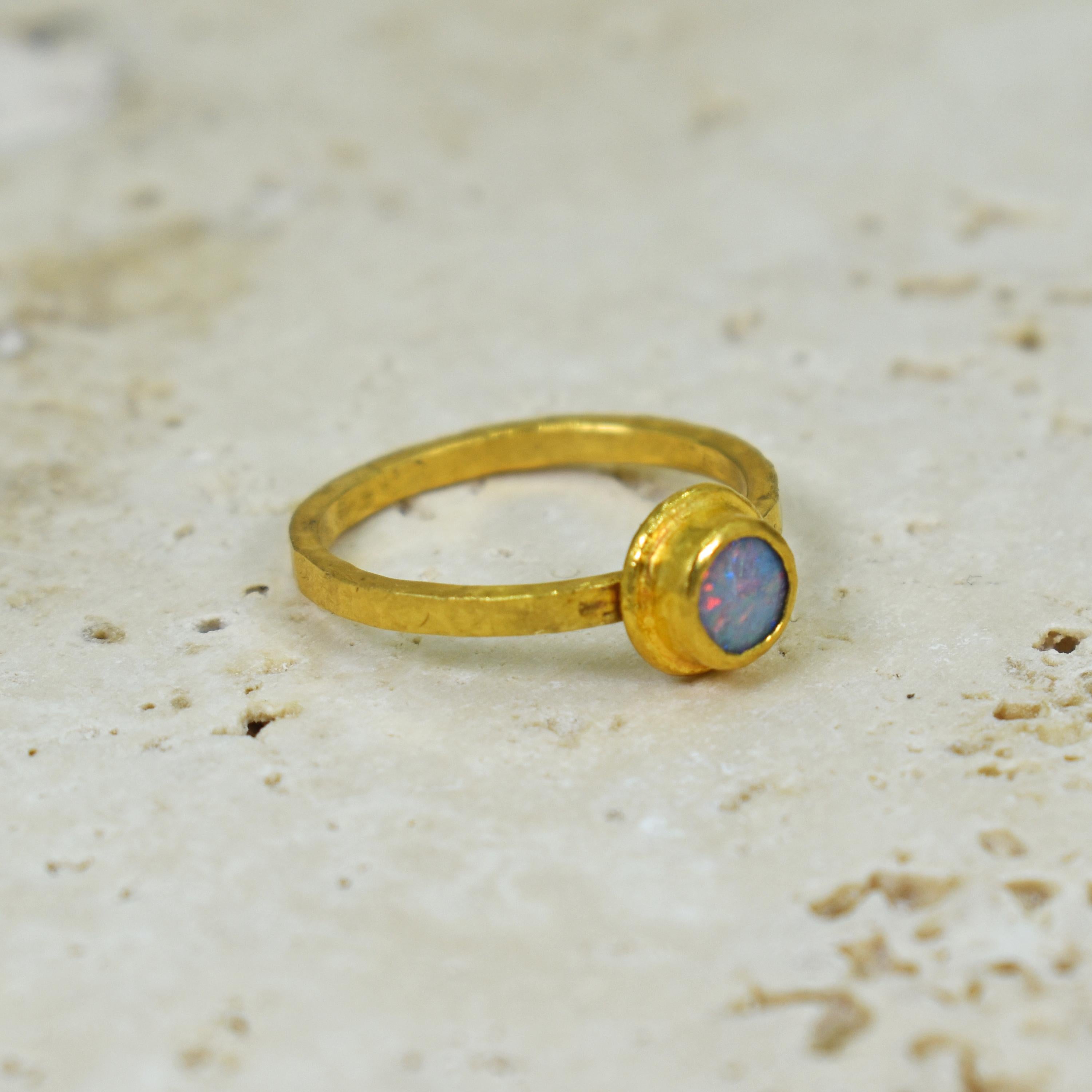 Lilac / Periwinkle Blue Opal and 22k yellow gold bezel stackable artisan ring. Opal ring is size US 6, and can be resized. Contemporary, yet rustic style, finished with a hammered, satin texture. This delicate, minimal ring with a gorgeous, colorful