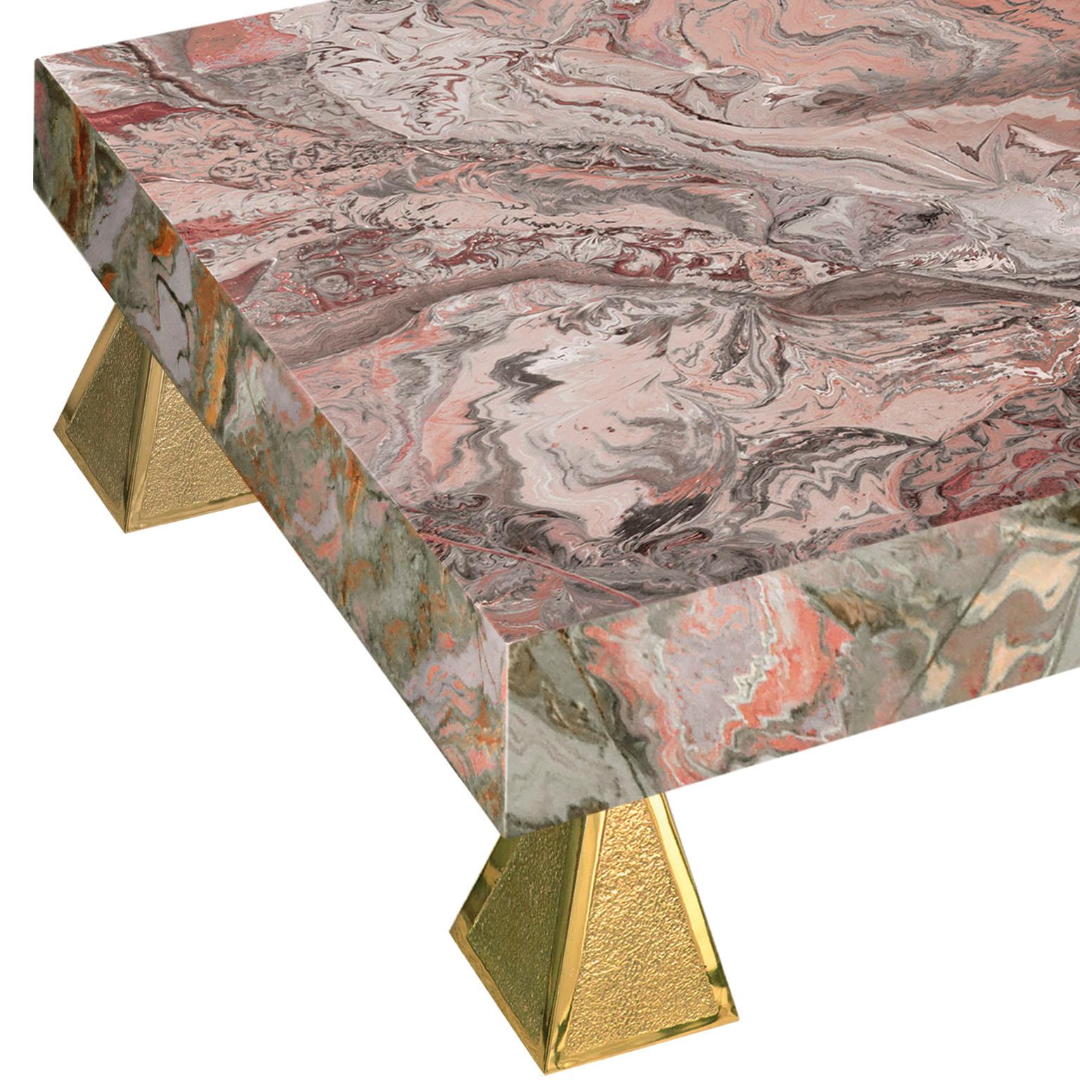 Perla A coffee table will add a final and sophisticated touch to your house.
This exquisite item is realized with a marbleized pearl grey scagliola top and matched to special brass bases to make your room suggestive and classy according to your own