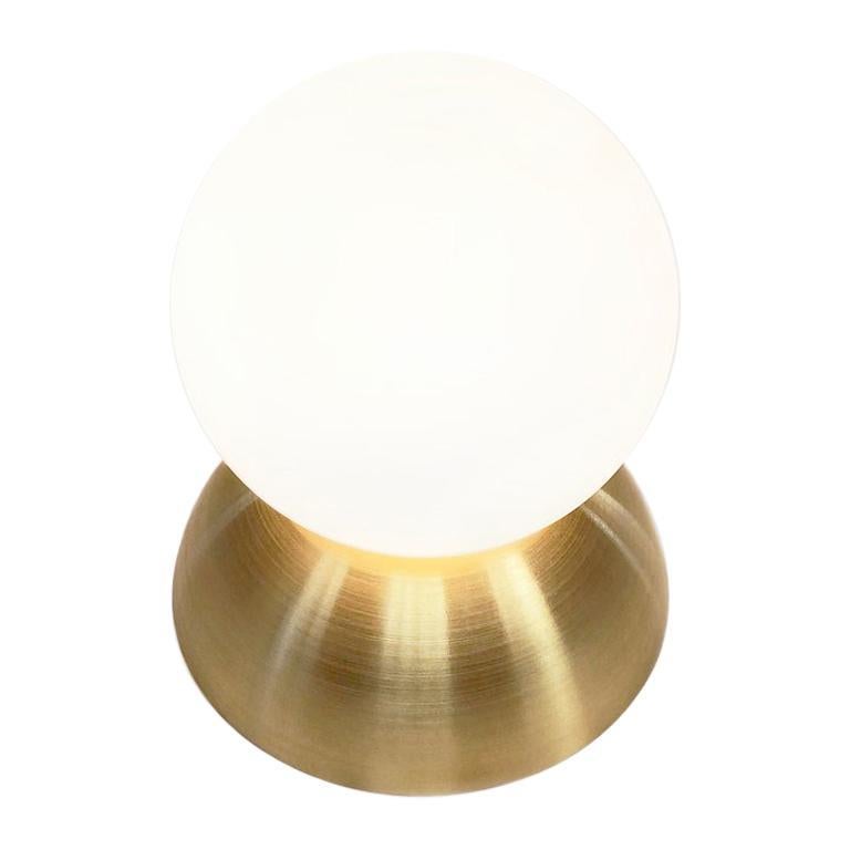 The Perle Flush Mount is fabricated with a spun brass base and a hand blown glass shade in the shape of a pearl.

W 4.5in (11.5cm) x D 4.5in (11.5cm) x H 5.75in (14.5cm)
(1) G9 LED bulb 4W equivalent to 40W (provided), K2700
120V/240V

Polished or