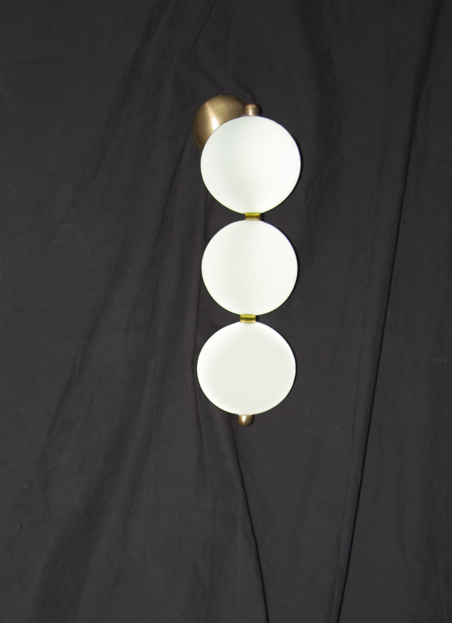Perle Collier and Courbes wall light by Ludovic Clément d'Armont
Every creation of Ludovic Clément d’Armont can be made to order in any requested dimensions. Please contact us for custom made creations.
Materials: Blown glass, brass,