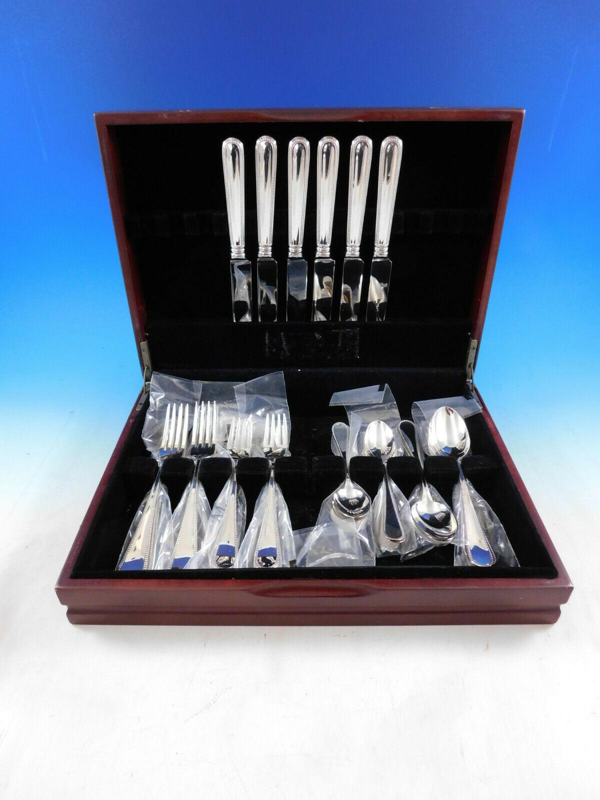 Fina's Italian Collection flatware is European size, meticulously crafted in Italy of the finest silver, inspired by traditional European sterling silver flatware. 

Perlinato by Fina Italy sterling silver flatware set, 30 pieces. This set