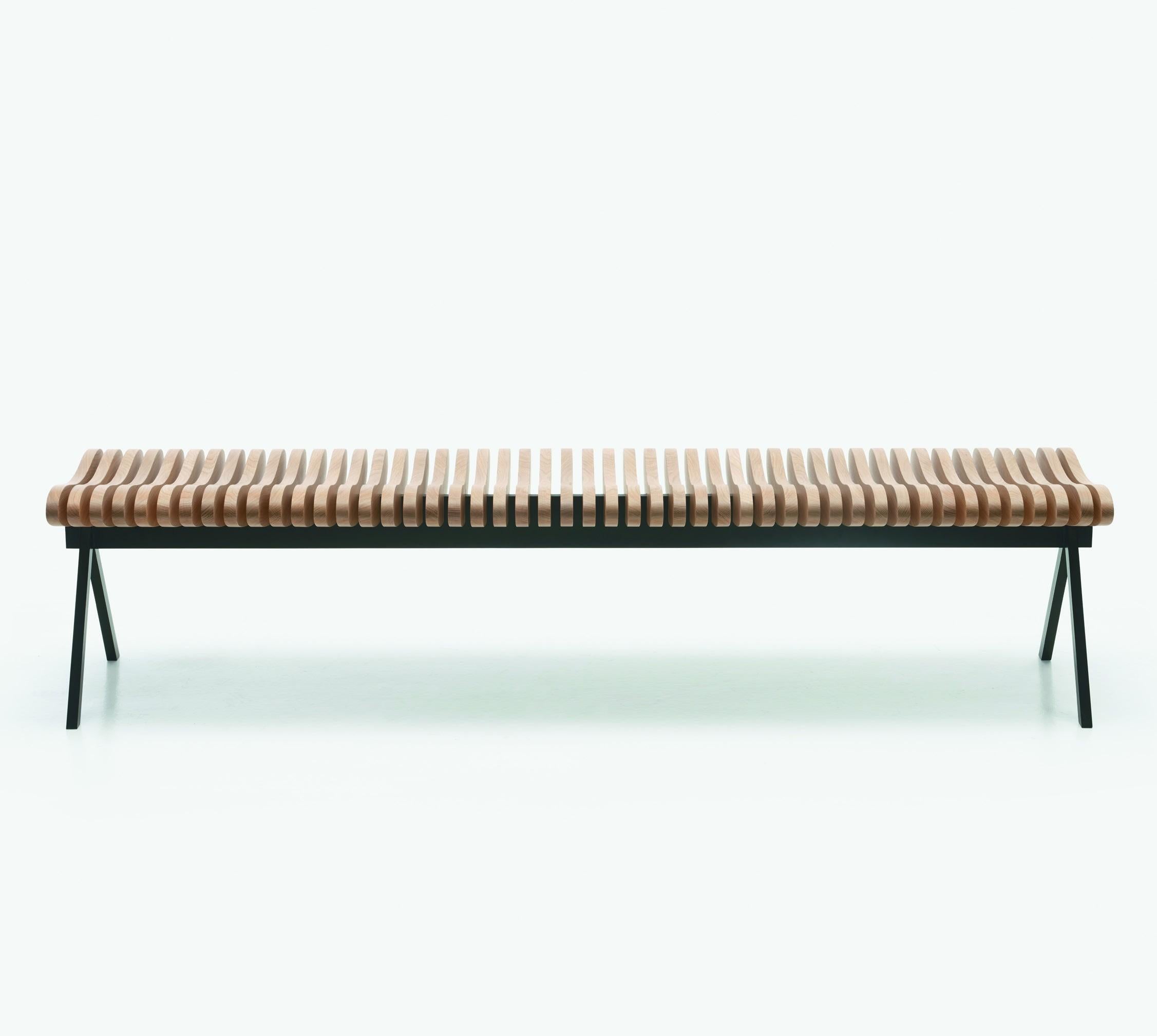 Perlude oak bench large by Caroline Voet
Dimensions: 190 x H 43 cm
Materials: Natural oak
Also available in seating oak black, seating walnut natural, seating teak (outdoor).

The Perlude benches are assembled from top grade FSC-labelled wood,