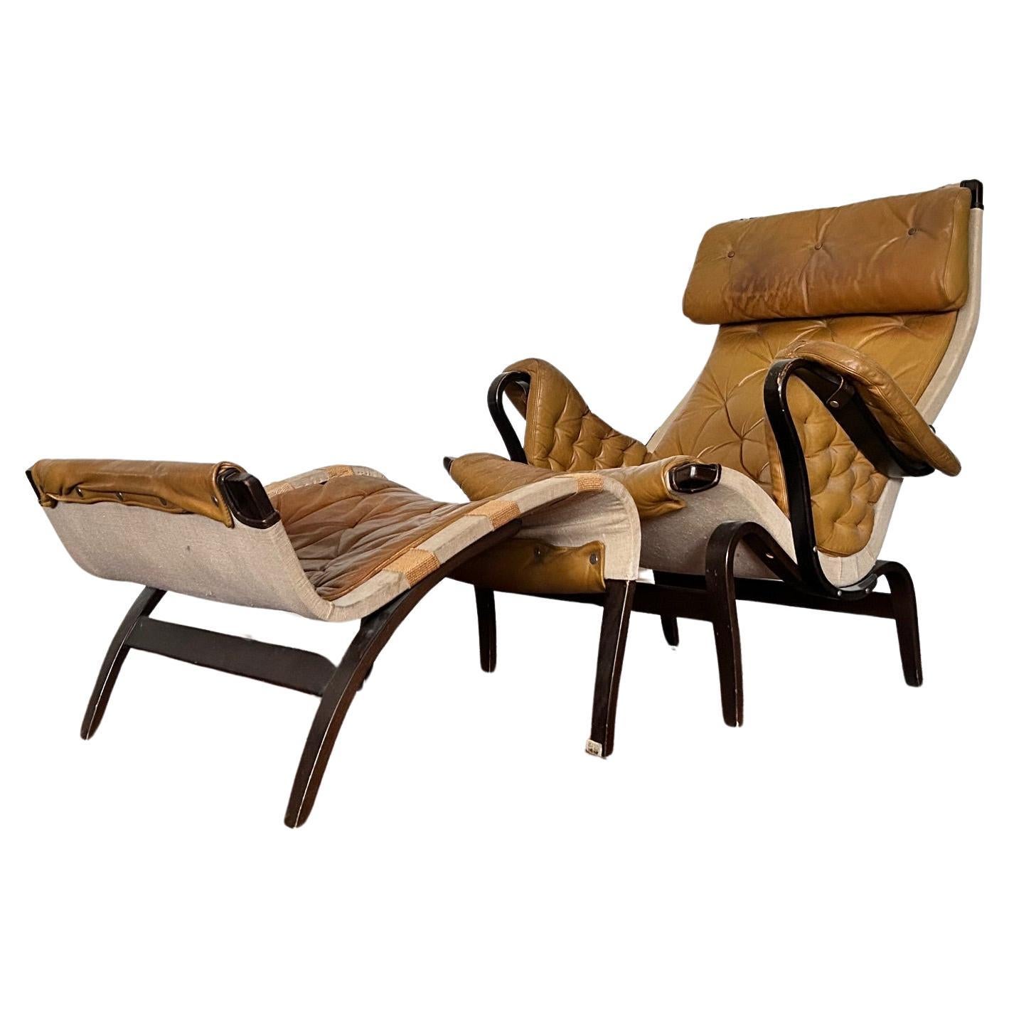 Pernilla Leather Lounge Chair and foot stool by Bruno Mathsson for DUX For Sale