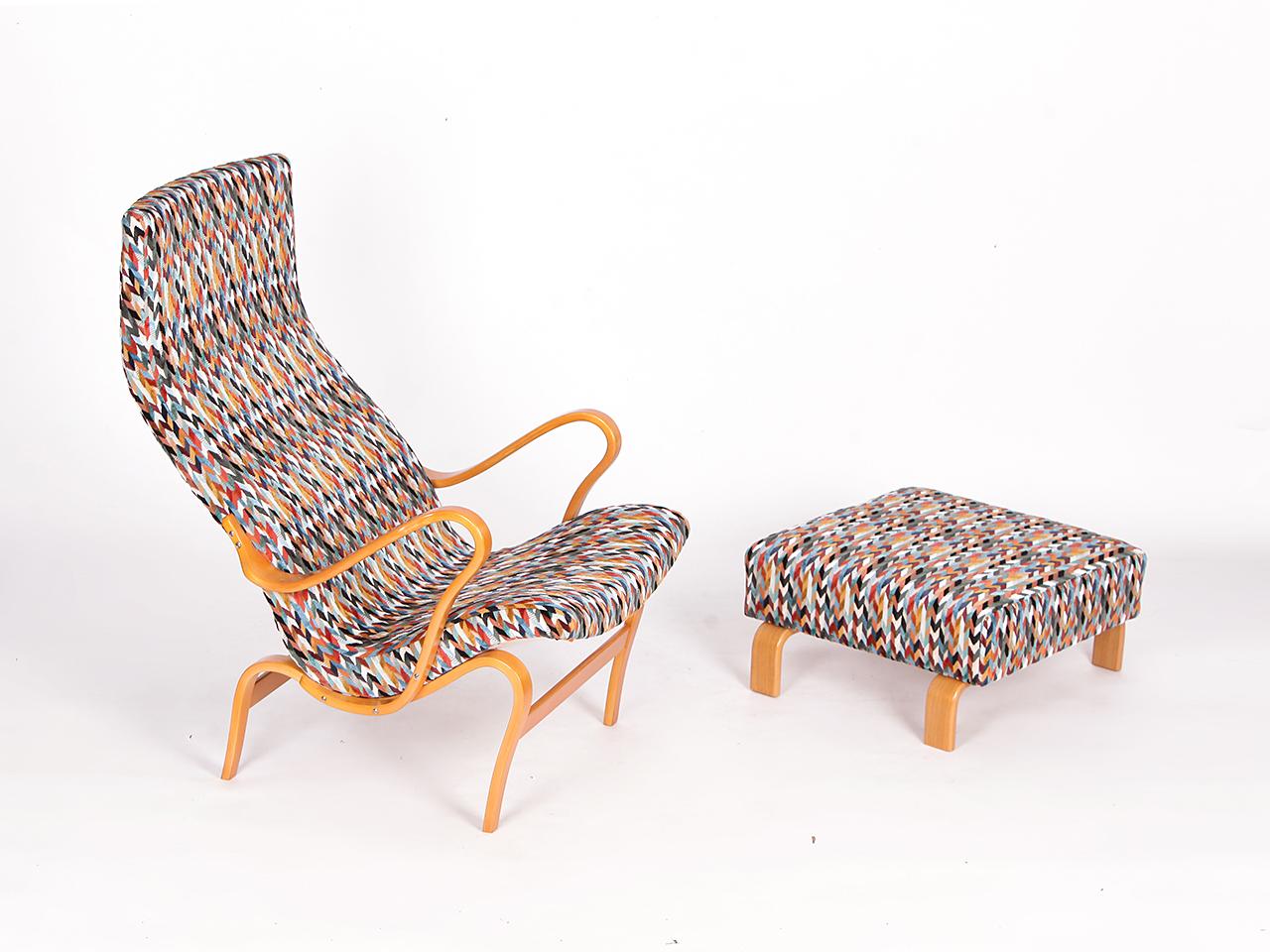 This design icon by Bruno Mathsson was produced in Sweden during the 1970s for Dux.
Completely restored and comfortable upholstered. The wooden frame was repainted.
Covered with a fabric by Osborne &  Little. 
The frame is stamped with the maker’s