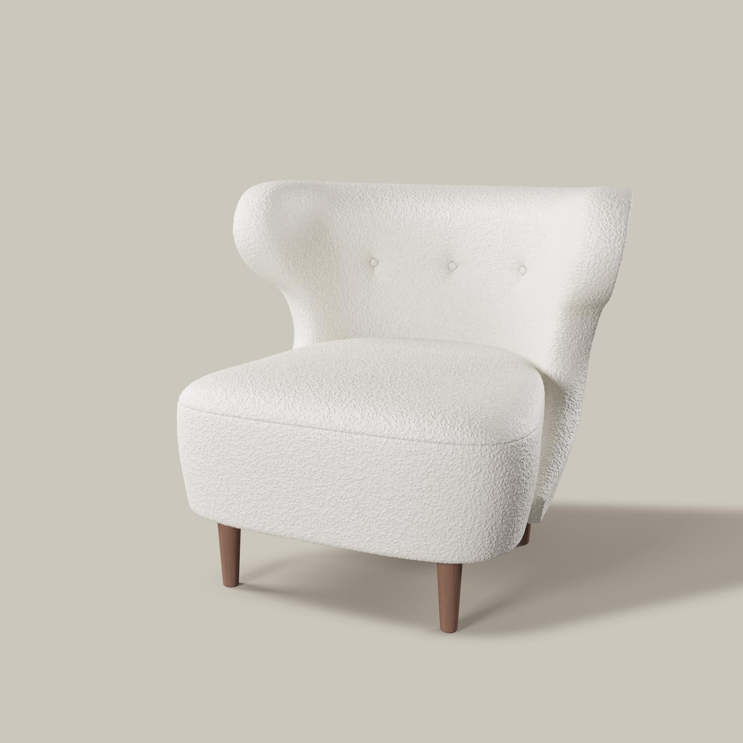 The Perou armless chair, with its sensual rounded form, is cozy but chic, also inspired by the classic Scandinavian designers such as Finn Juhl and Philip Arctander.

Ships in approximately 8-10 weeks. Dates are subject to change based current