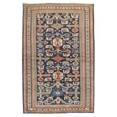 Tapis caucasien ancien Perpedil bleu du début du 20e siècle