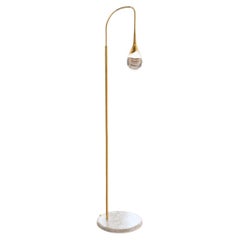 Perpetua travertino base brass floor lamp, natural brass finish