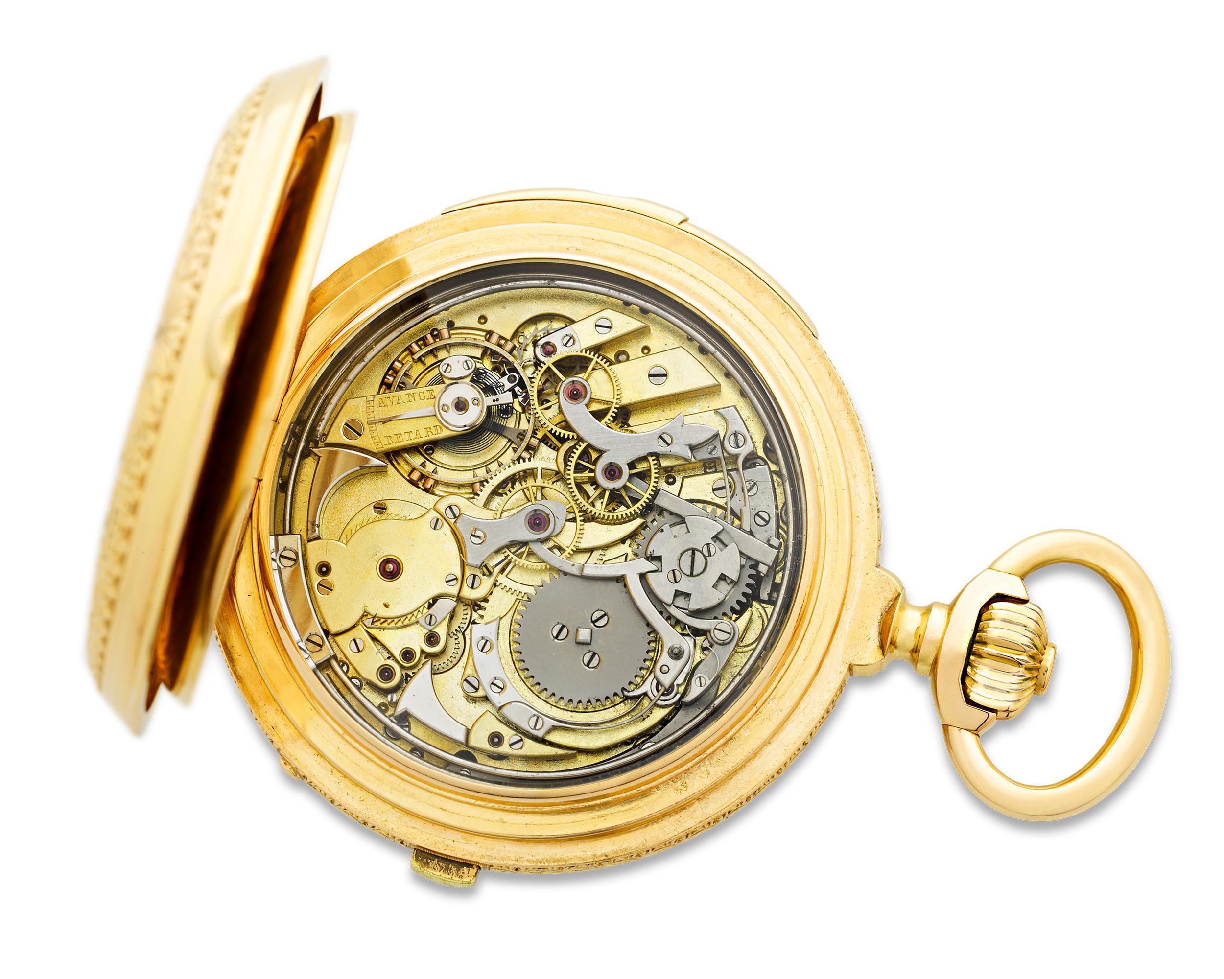 Created by the famed Swiss watchmaker firm Marius LeCoultre, this perpetual calendar chronograph pocket watch features a beautifully crafted 18K rose gold case decorated in a foliate and scroll motif. The white enamel dial tells the time with both
