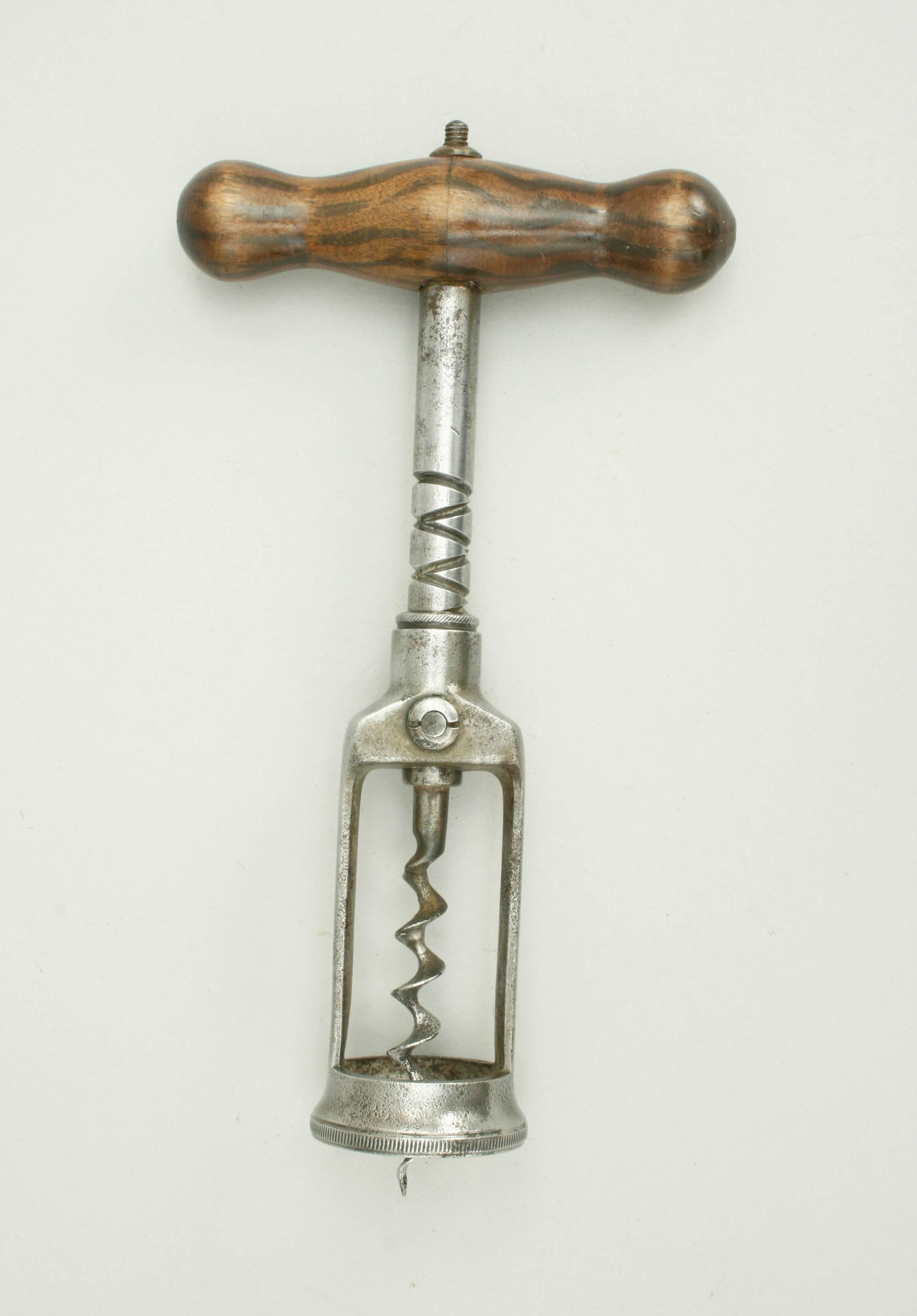 Vintage perpetual corkscrew.
An open frame perpetual corkscrew with double cross over thread on the shaft. This is a very effective design of cork screw patented by Ernst Demmler in 1884. By continually turning the handle the worm is screwed into