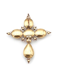 Perpignan garnet cross pendant in 18 karat gold