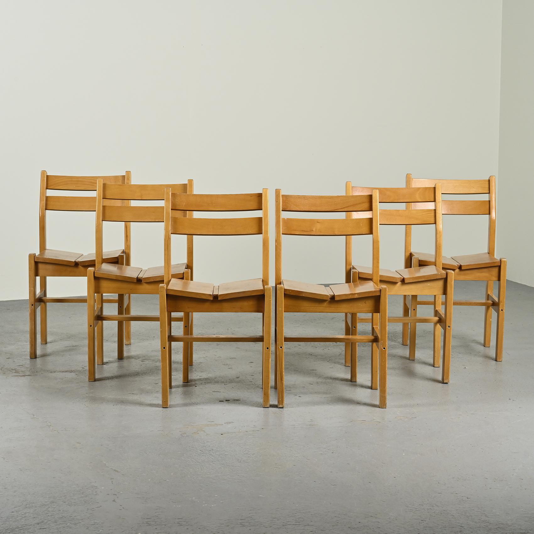 These chairs were selected by Charlotte PERRIAND for Les Arcs Ski Resort.

Set of six chairs in solid elm wood specially chosen for the ski resort Les Arcs.

The seat has two cut corners, and the backrest is openwork.

Provenance: La Cascade