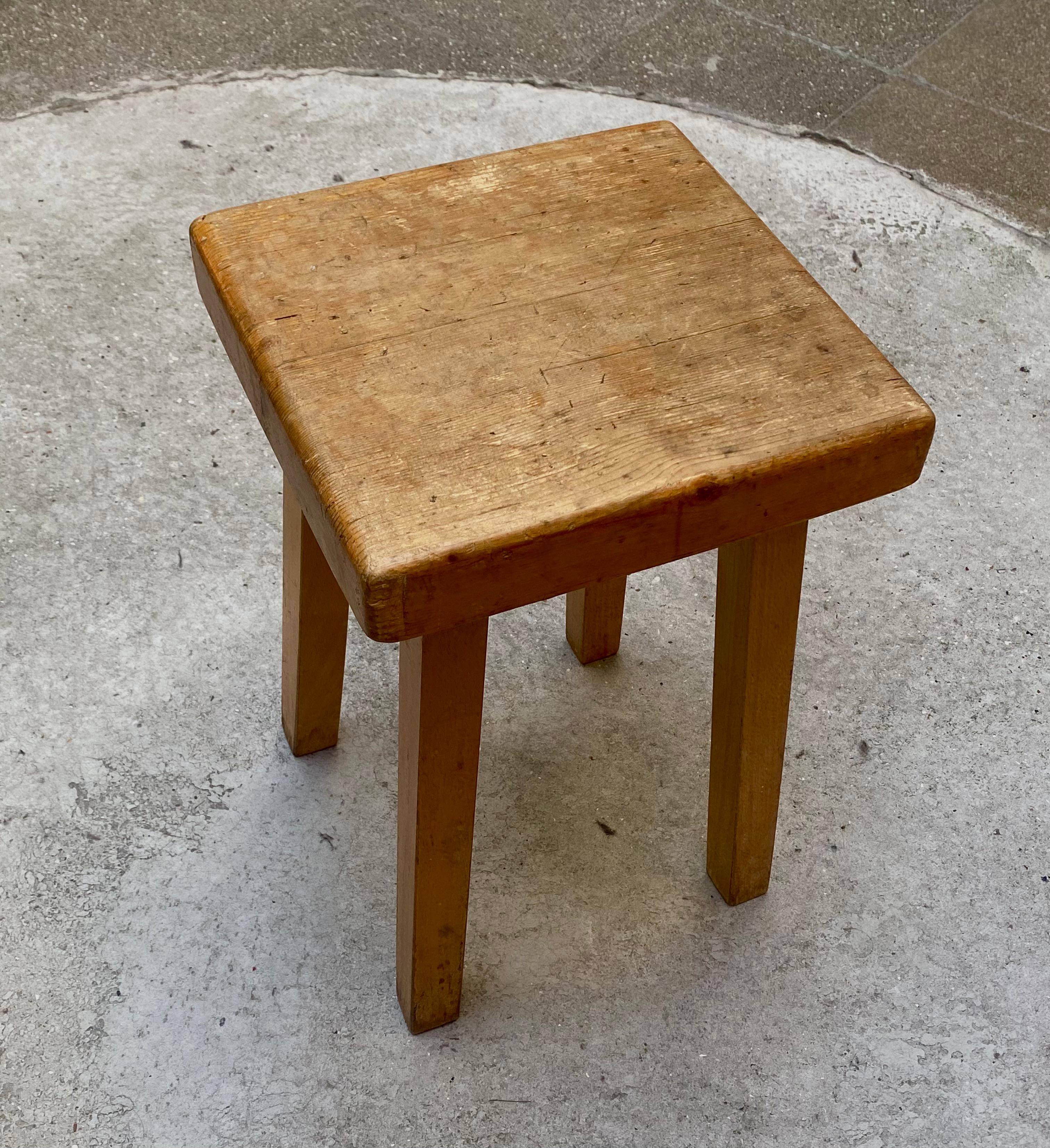 Perriand stool 
Pine wood stool by Charlotte Perriand for Les Arcs 1800. 
Square seat. 
Quadripod base.
Very nice patina.
Provenance: residence l'Aiguille Grive.
1960s. 
Very good condition.
midcentury
dimensions: 29 x 29 x h 45 cm
price: 1900 €.