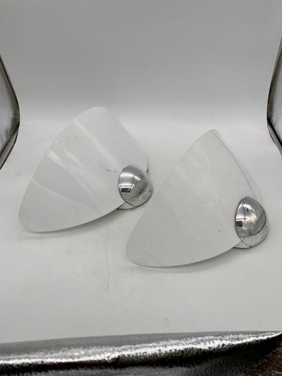 Pair of Aura wall lights made by the famous designer's Perry King & Santiago Miranda in 1989 and produced by Arteluce, the prestigious Italian company founded by Gino Sarfatti in 1936, and from 1974 part of the Flos group, specializing in the