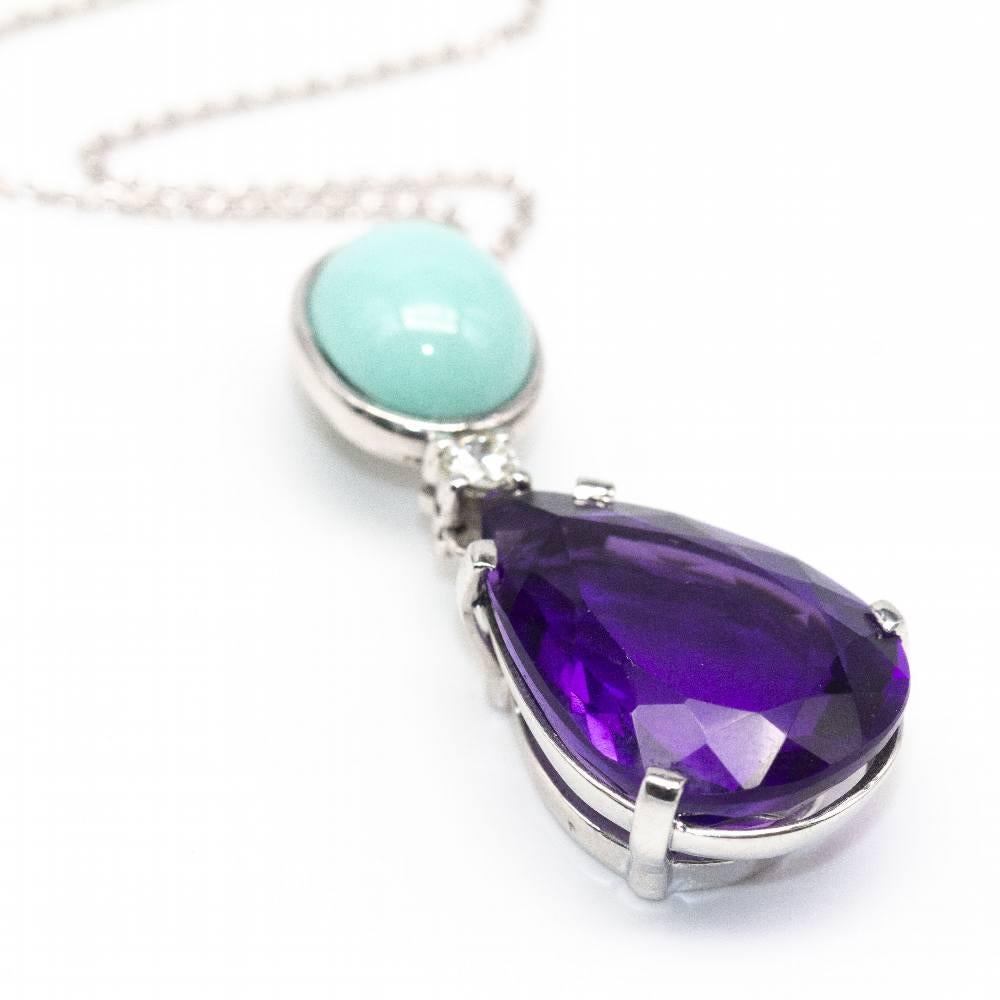 Spettacolare collana d'oro con turchese, diamante e ametista per donna  1x 0,15ct Diamante taglio Brilliante in qualità G/VS  1x Turchese naturale persiano cabochon ovale di 10x12 mm e 1x Ametista a taglio pera di circa 25,00cts.  oro bianco 18