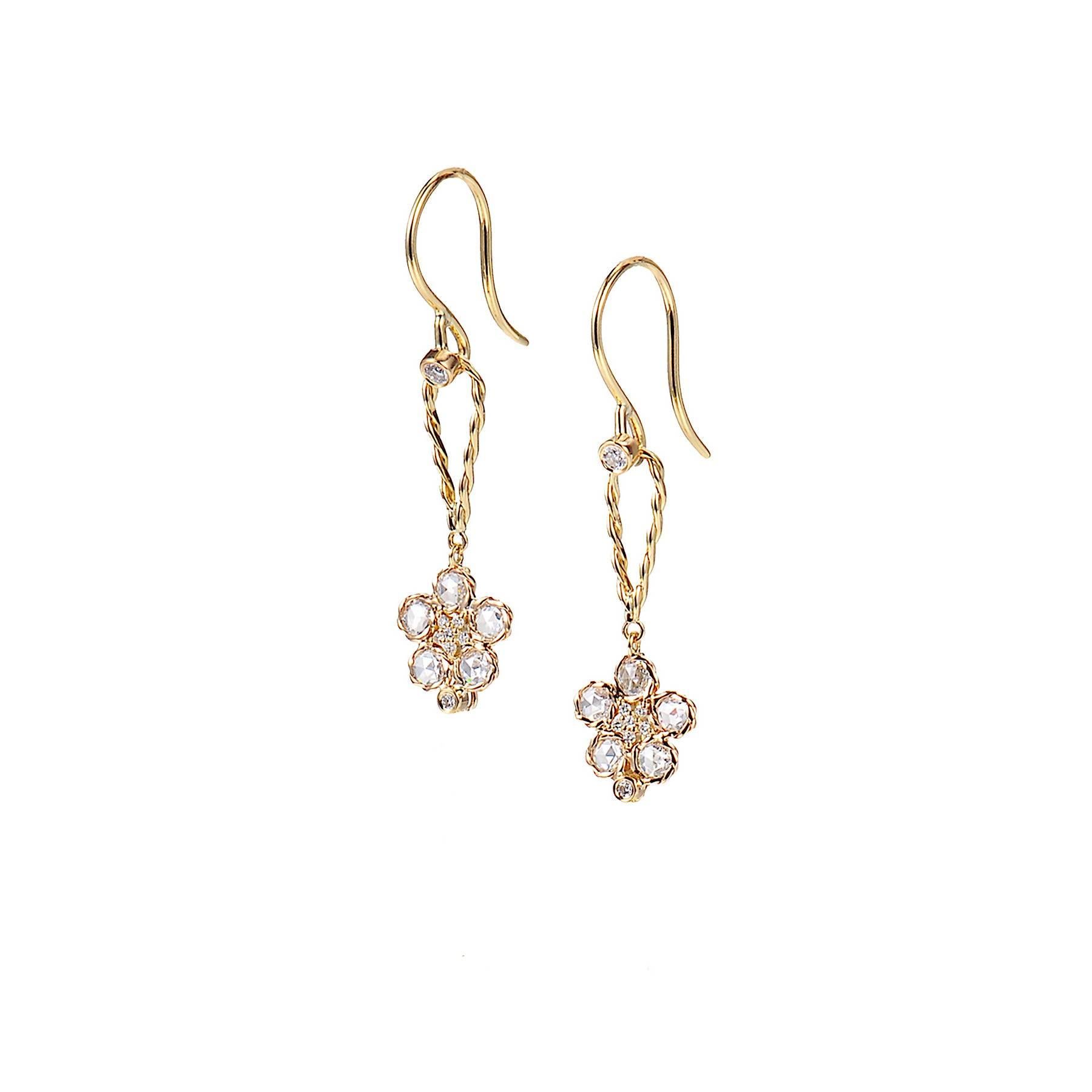 Persephone earrings is from JeweLyrie's Allongé collection,  each featuring 5 rose-cut white diamonds,  hand set in JeweLyrie signature twist bezels, punctuated with small brilliant cut bezel set diamonds, arranged in floral pattern.  The wavy vine