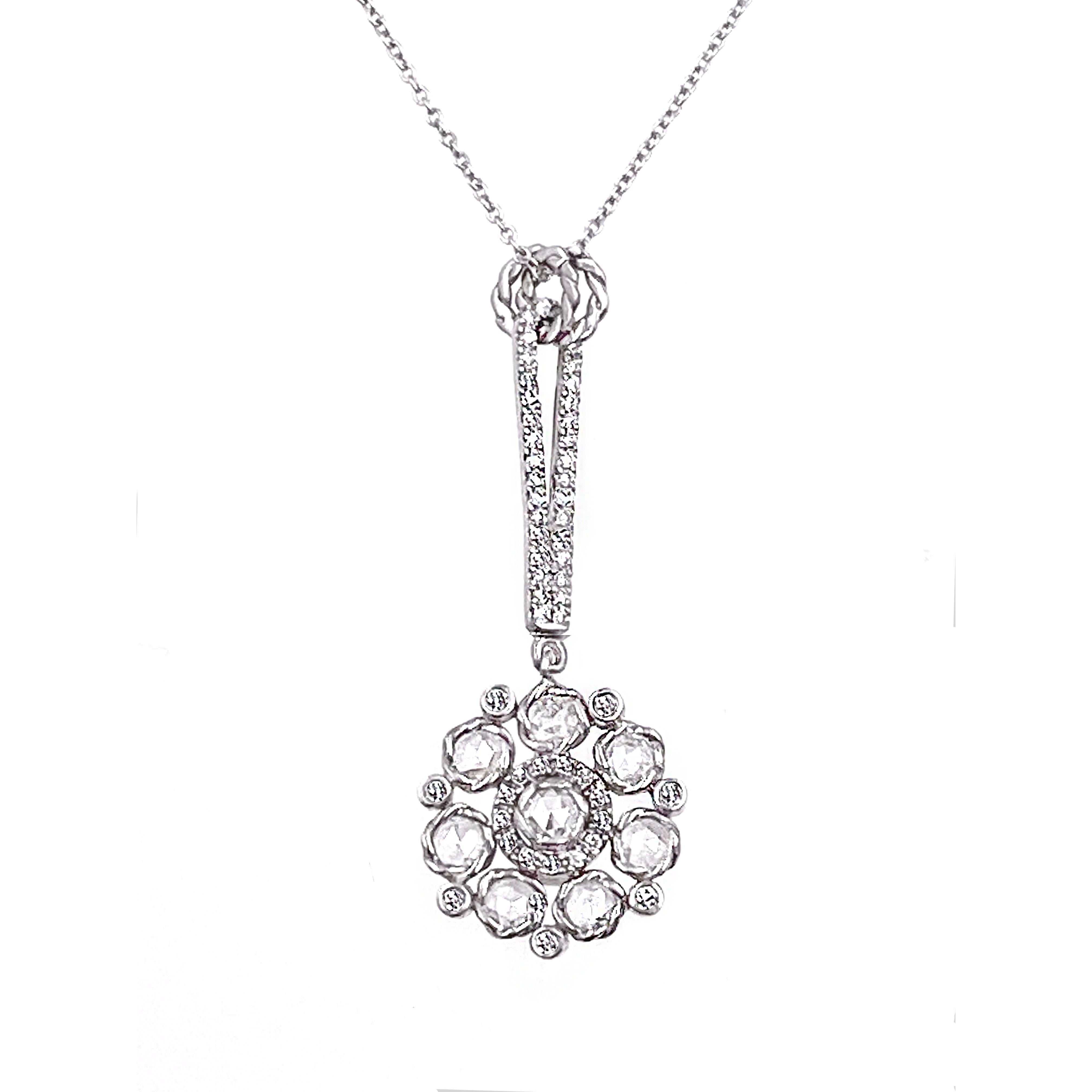 PERSEPHONE rose-cut diamond bouquet pendant necklace featuring a 15mm rose cut diamond bouquet, that has 8 rose cut diamond wrapped in our signature twist bezels and complemented by micro pavé diamond inner halo and 7 small bezel set diamonds. The
