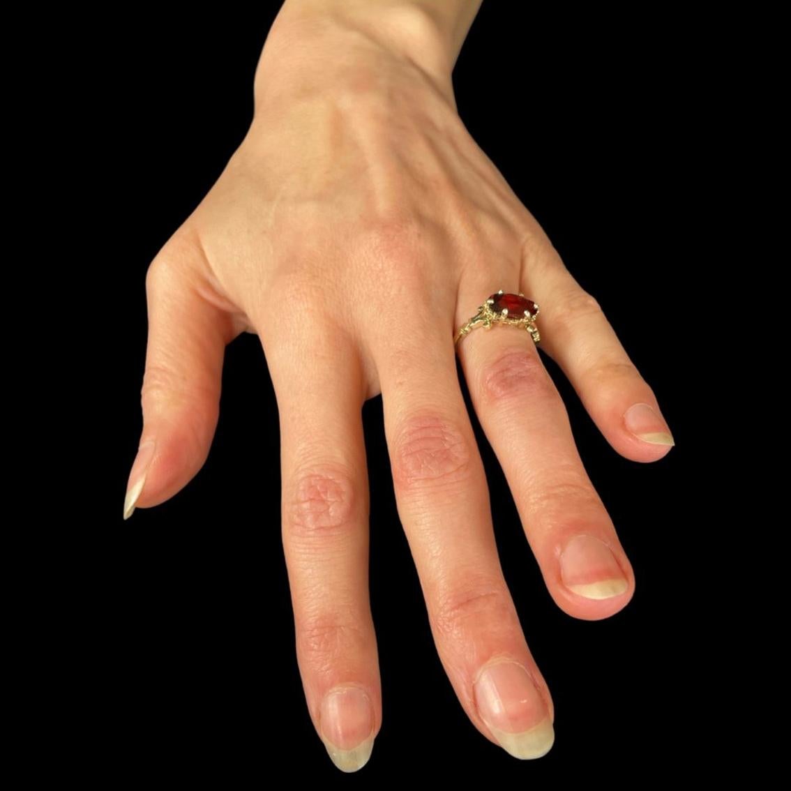 Oval Cut Persephone's Pomegranate Ring in 9 Karat Yellow Gold with Oval Garnet