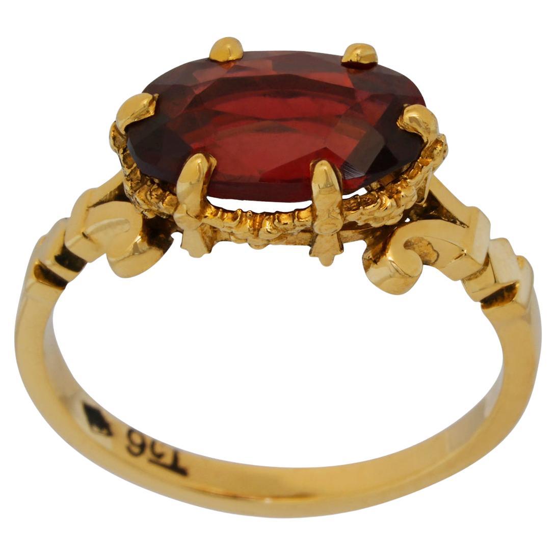 Persephone's Pomegranate Ring in 9 Karat Yellow Gold with Oval Garnet