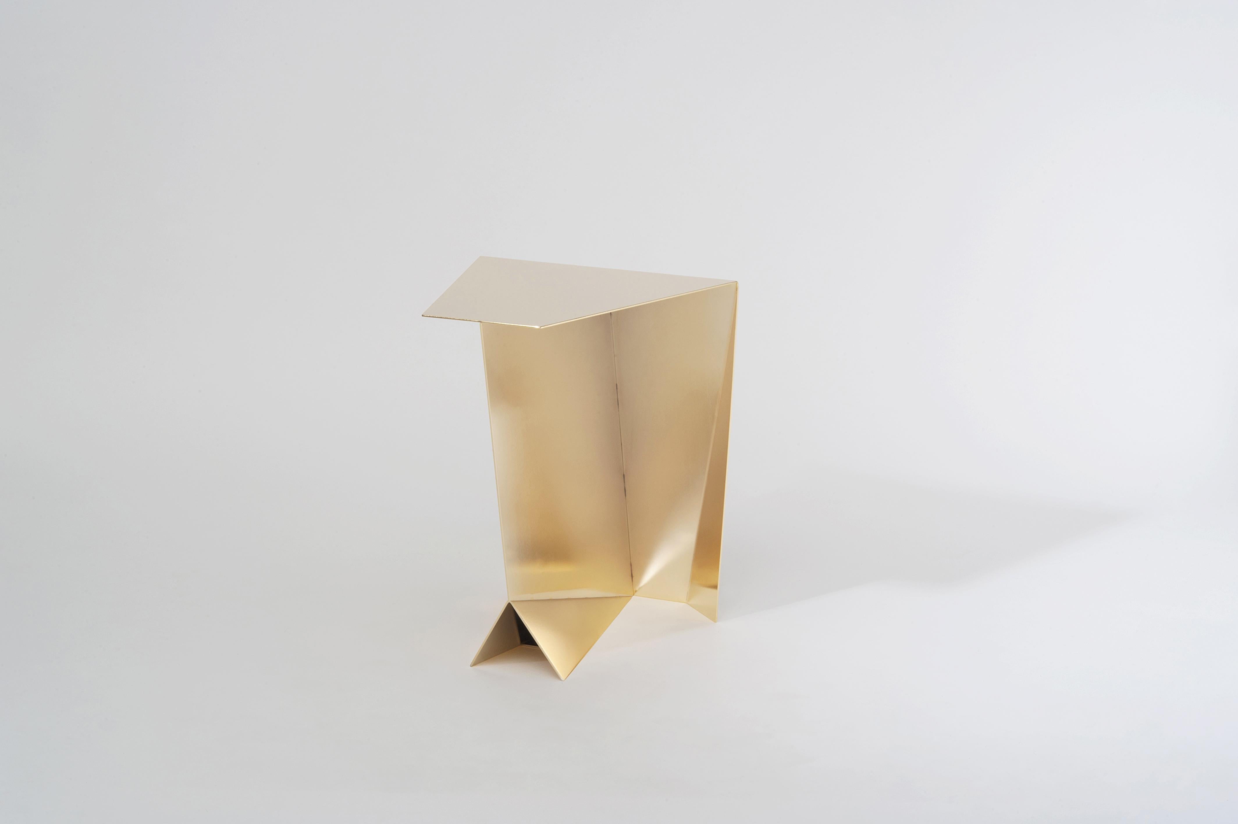 Perseus side table is conceived by 06d design studio

Golden stainless steel. Satin finish.
Measures: 55 x 43 x 43 cm

Limited edition of 33 pieces.