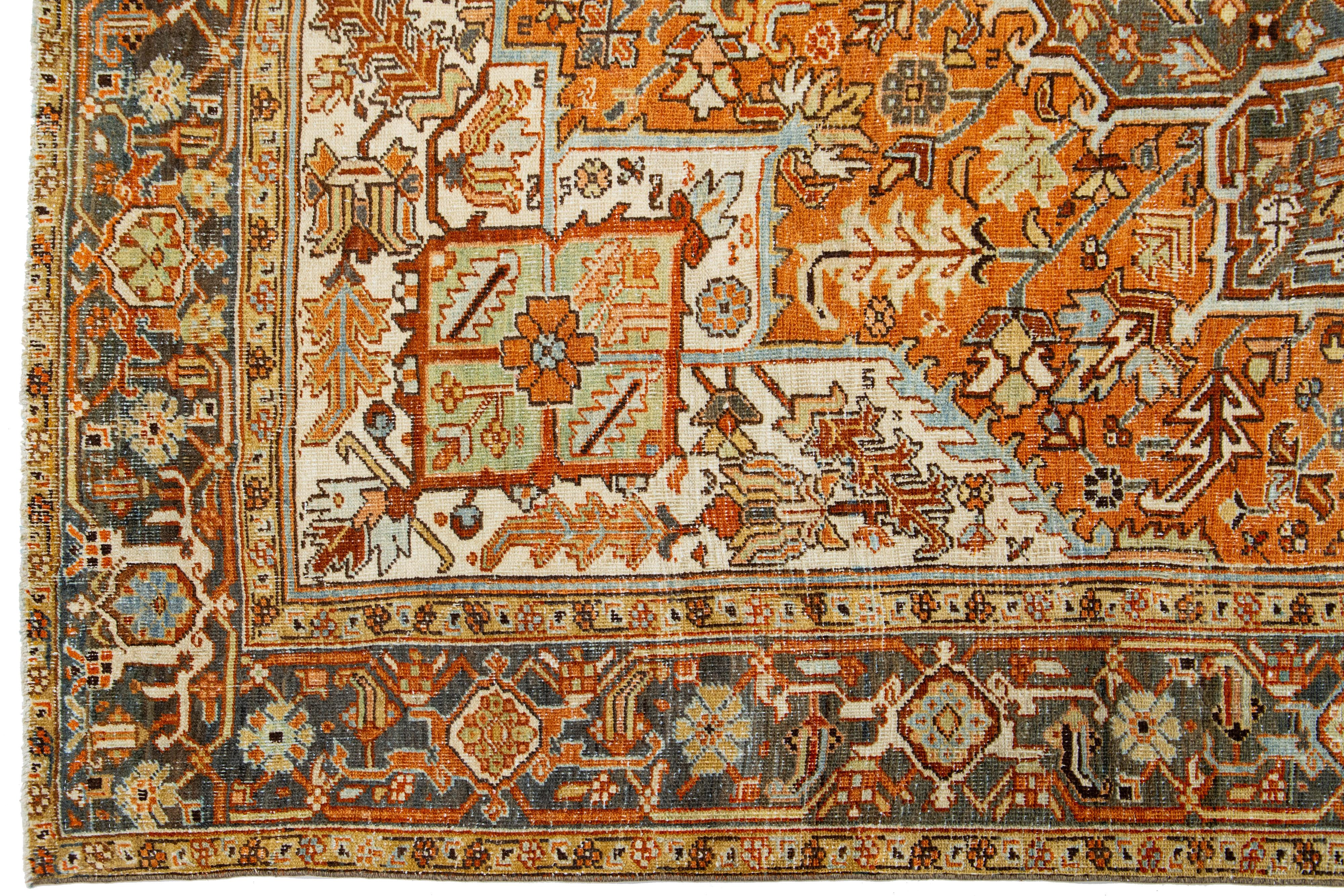 Persian 1910s Antique Heriz Medallion Wool Rug With Orange-Rust Color Design In Excellent Condition For Sale In Norwalk, CT
