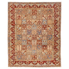 Tapis persan Bakhtiari des années 1920 en laine multicolore avec motif sur toute la surface
