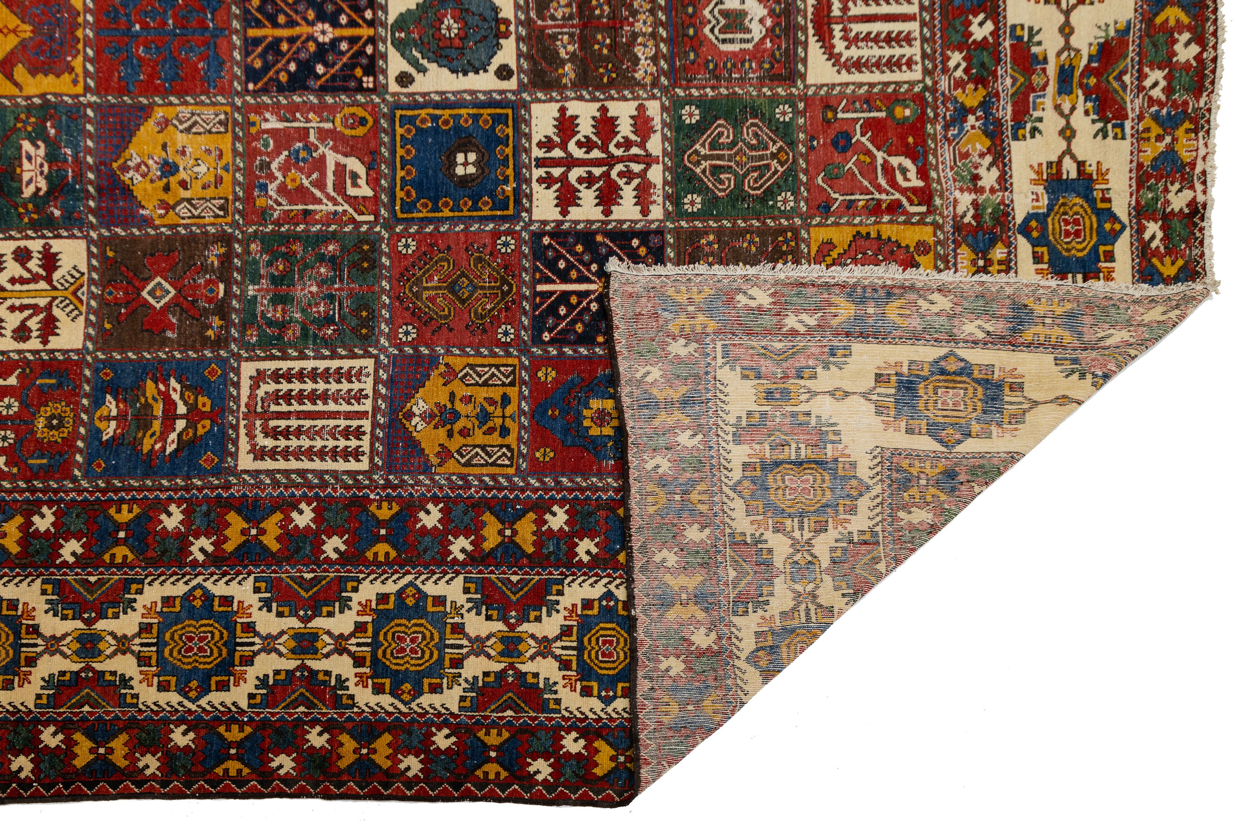 Islamic Persian 1920s Bakhtiari Red Wool Rug With Allover Pattern In 14 x 20 For Sale