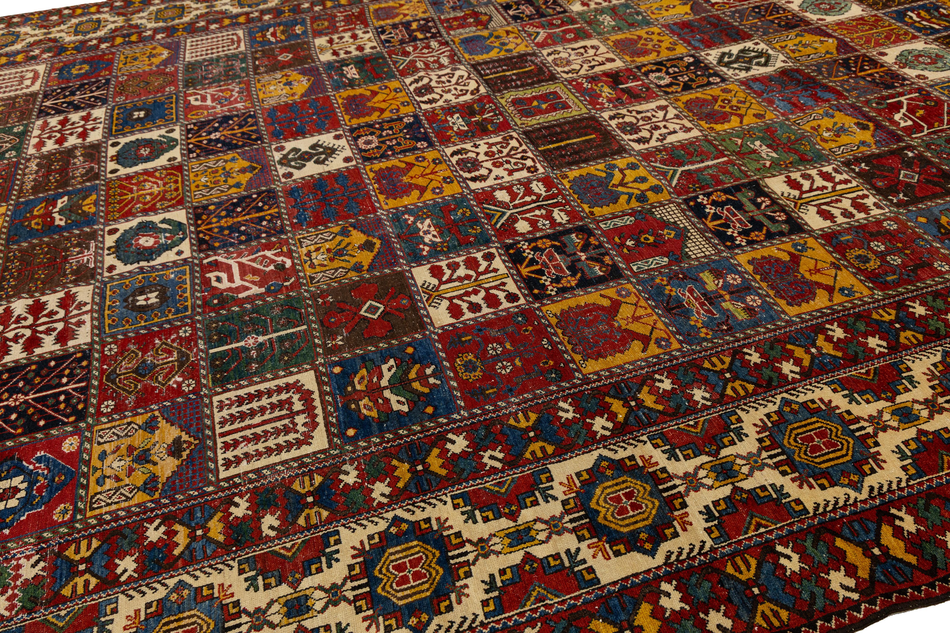 20th Century Persian 1920s Bakhtiari Red Wool Rug With Allover Pattern In 14 x 20 For Sale