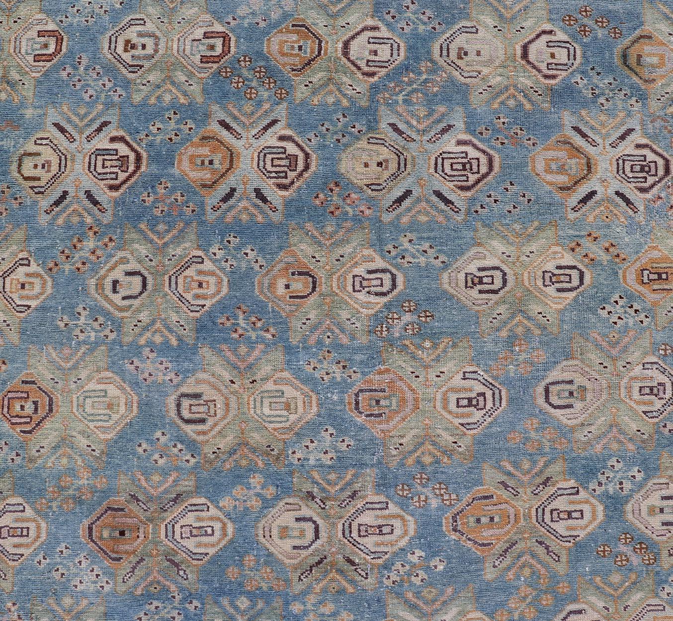 Hand-Knotted Persian Antique Afshar Rug in Light Blue Background With Tribal Floral Motifs  For Sale