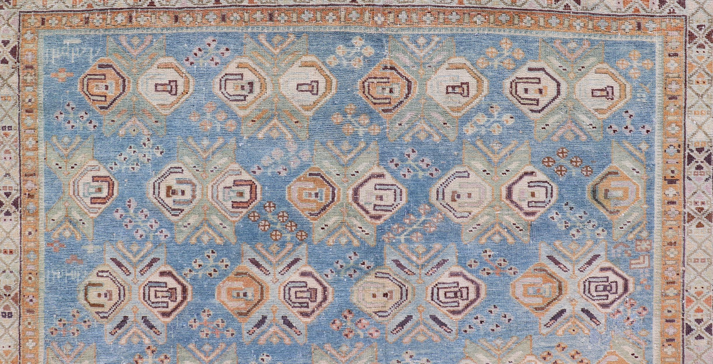 20th Century Persian Antique Afshar Rug in Light Blue Background With Tribal Floral Motifs For Sale