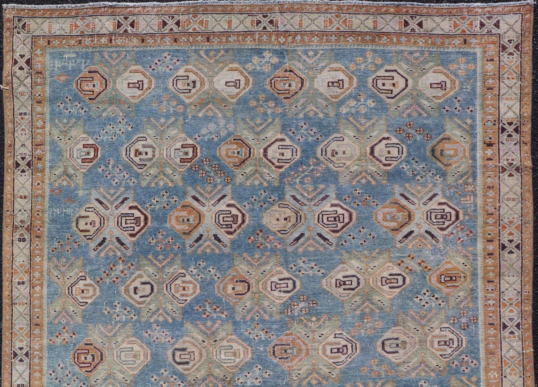 Wool Persian Antique Afshar Rug in Light Blue Background With Tribal Floral Motifs  For Sale