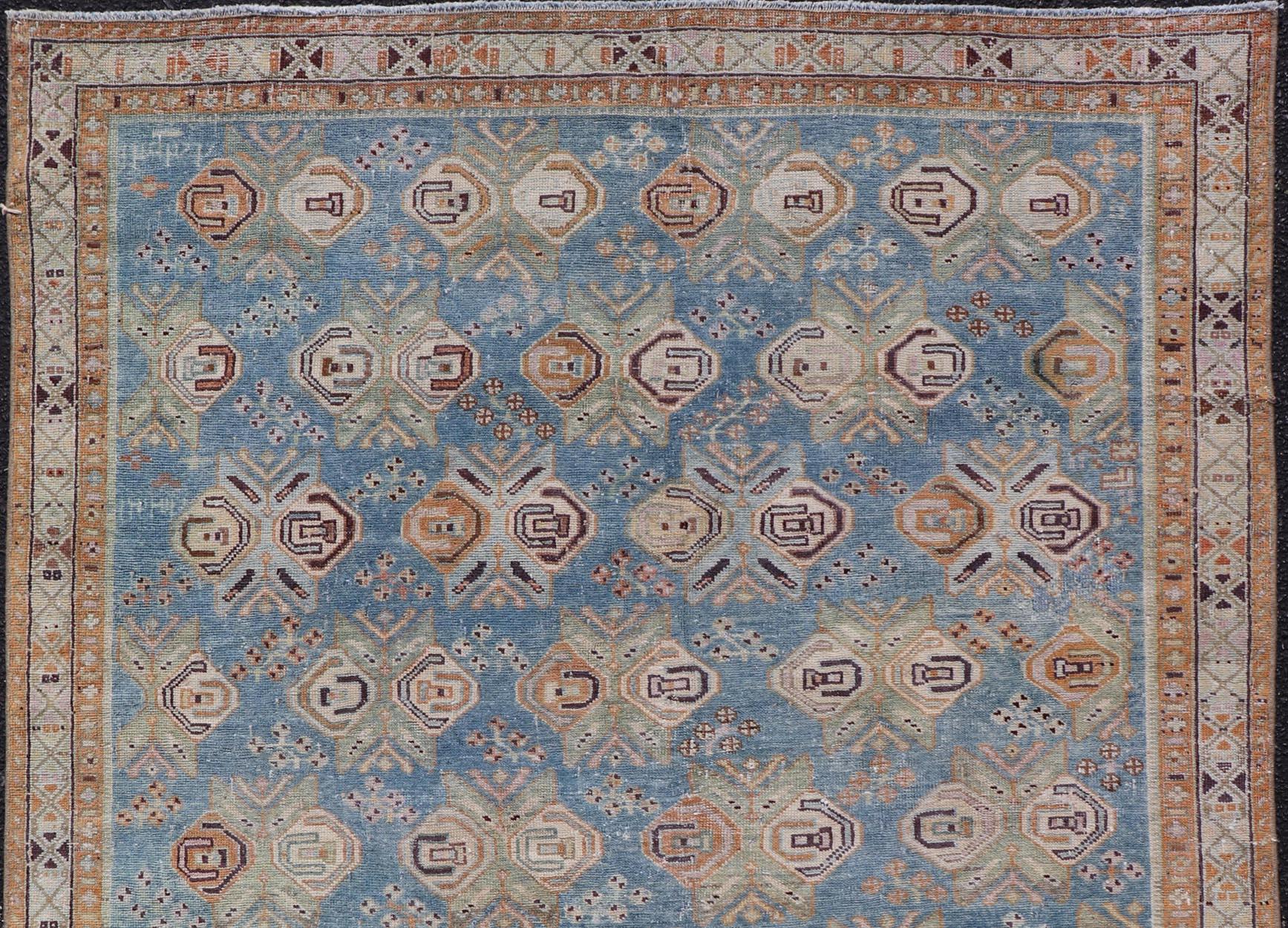 Wool Persian Antique Afshar Rug in Light Blue Background With Tribal Floral Motifs For Sale