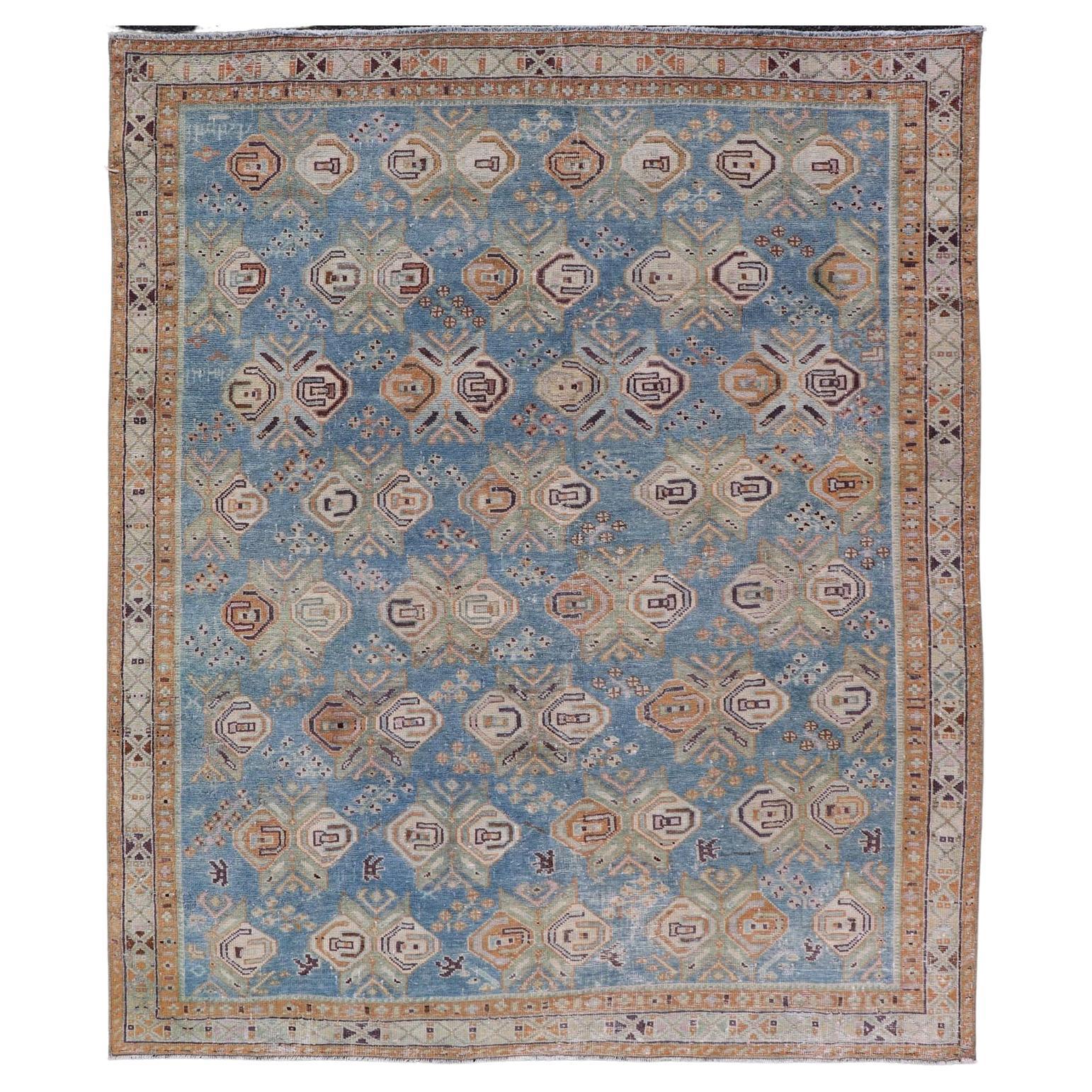 Persian Antique Afshar Rug in Light Blue Background With Tribal Floral Motifs  For Sale