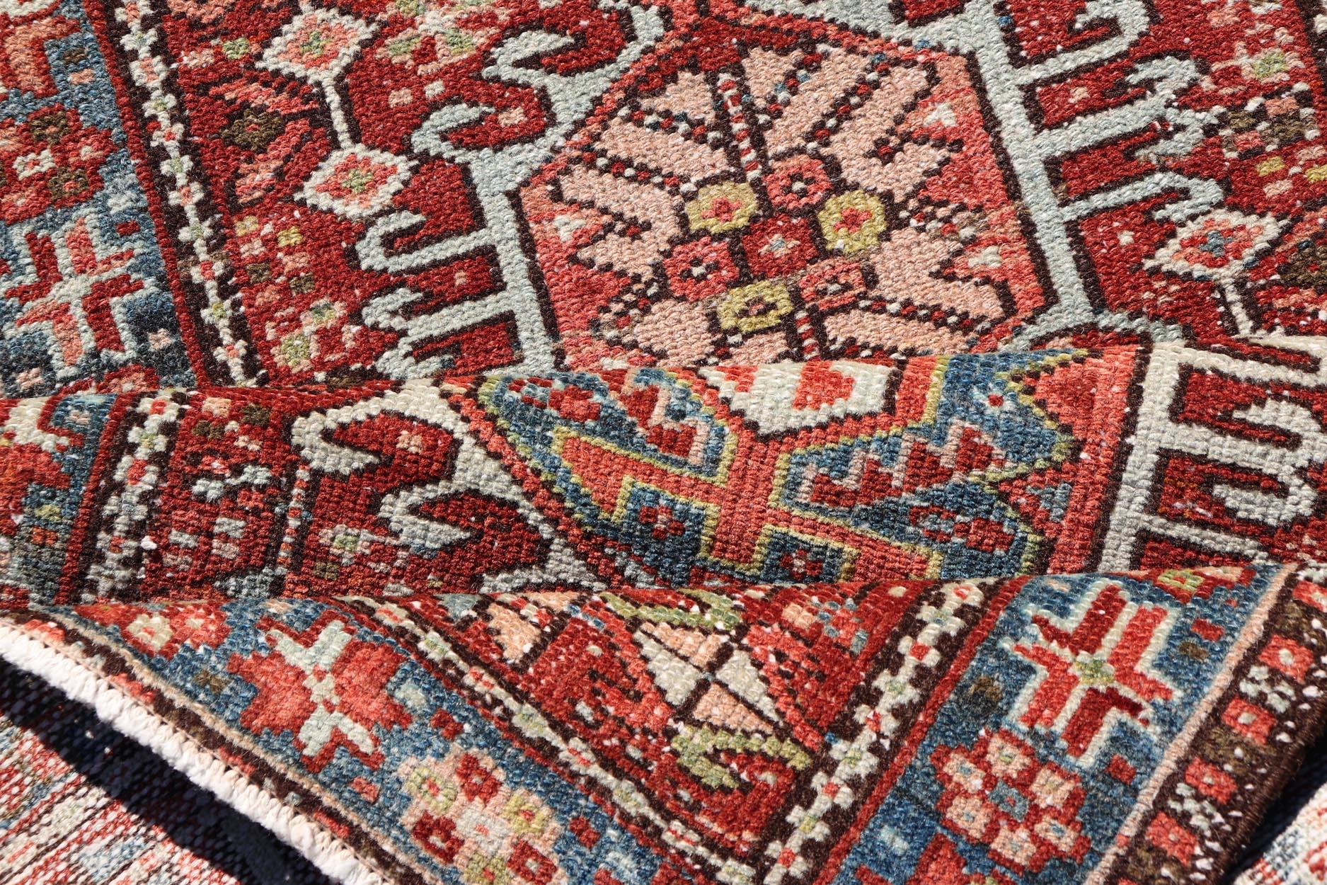 20th Century Persian Antique Heriz Distressed Small Runner with Geometrics in Multi-Color For Sale