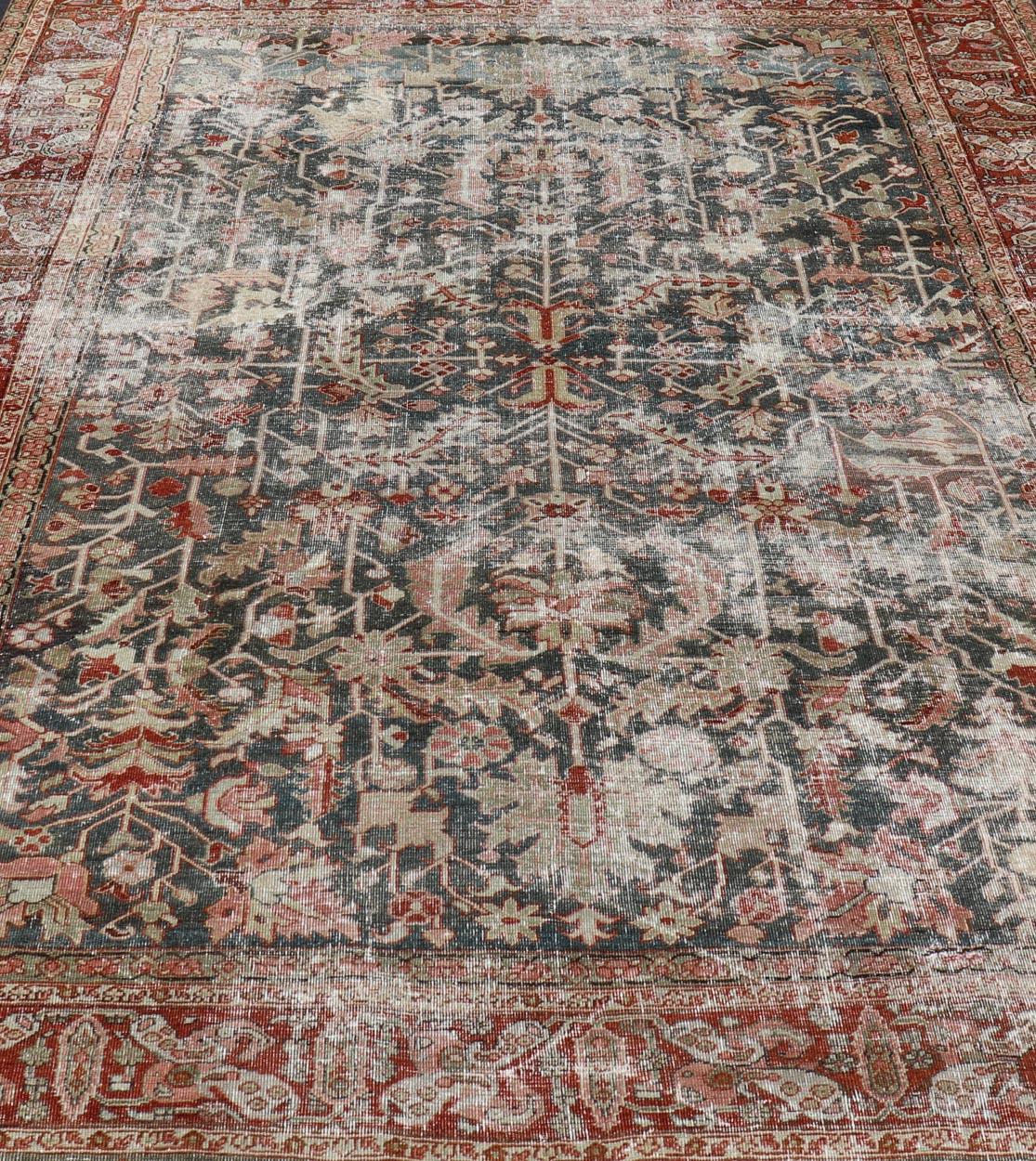 Persian Antique Heriz Rug with All-Over Geometric Design in Gray-Blue and Red. Keivan Woven Arts / Rug / LH-A38498, country of origin / type: Iran /Heriz, circa 1910. 
Measures: 8'5 x 11'2 
This lovely Antique Heriz rug, hailing from northwestern