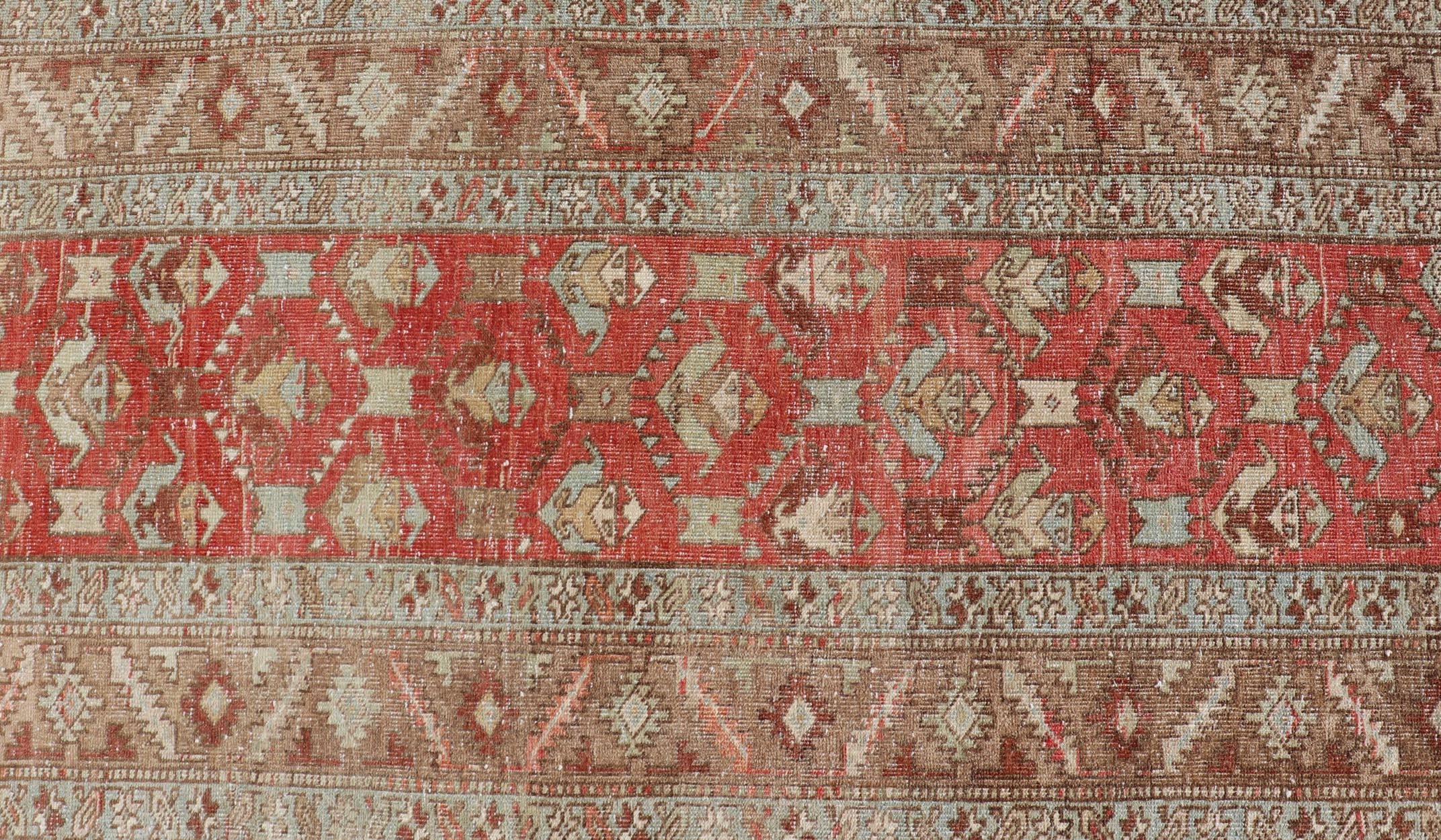 20th Century Persian Antique Heriz Runner With All-Over Geometric Design On A Red Field  For Sale